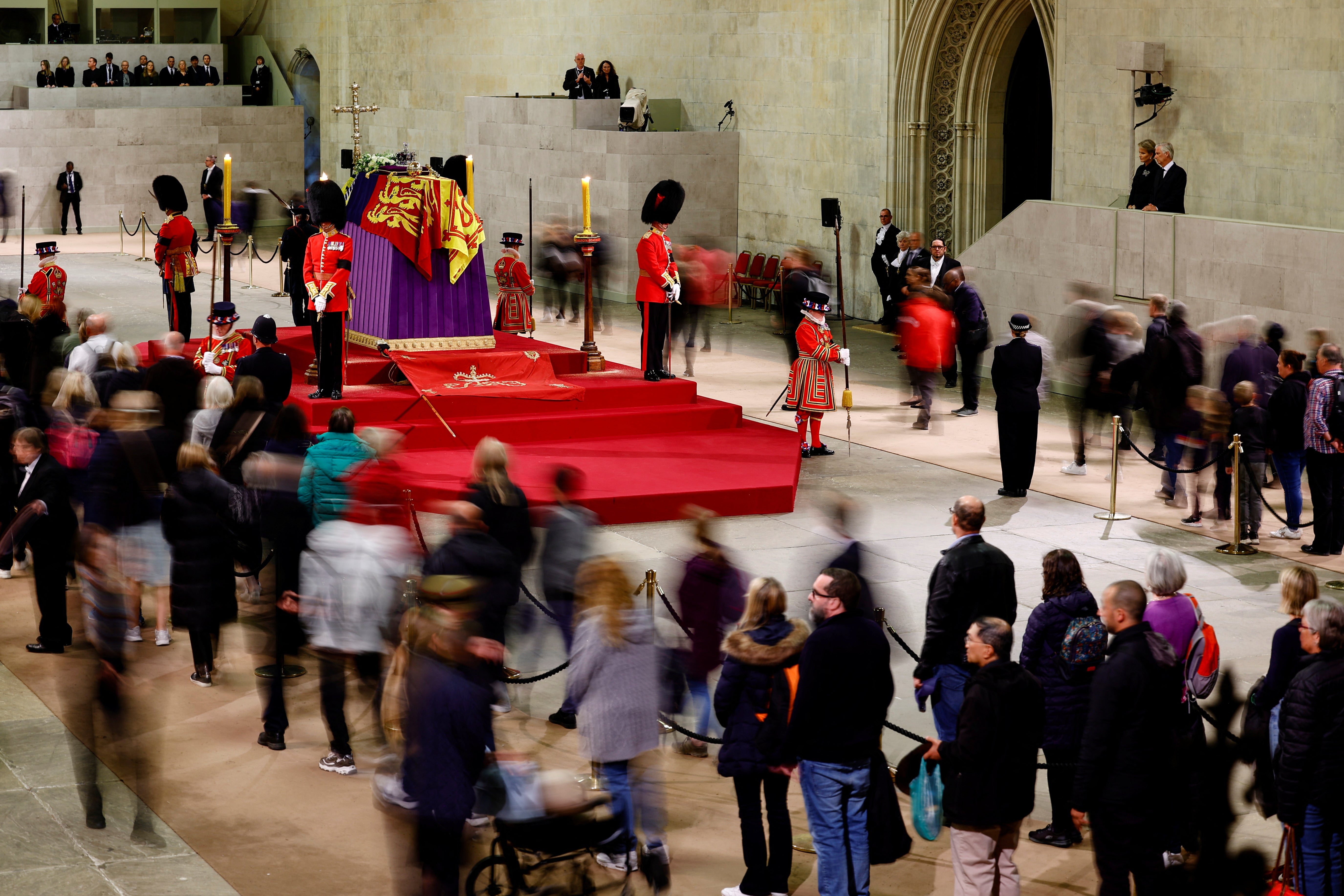 Members of the public were still viewing the coffin in state late into Sunday night