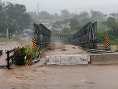 Puerto Rico: Video shows bridge being swept away as Hurricane Fiona brings flooding and 85mph winds