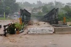 Puerto Rico: Video shows bridge being swept away as Hurricane Fiona brings flooding and 85mph winds