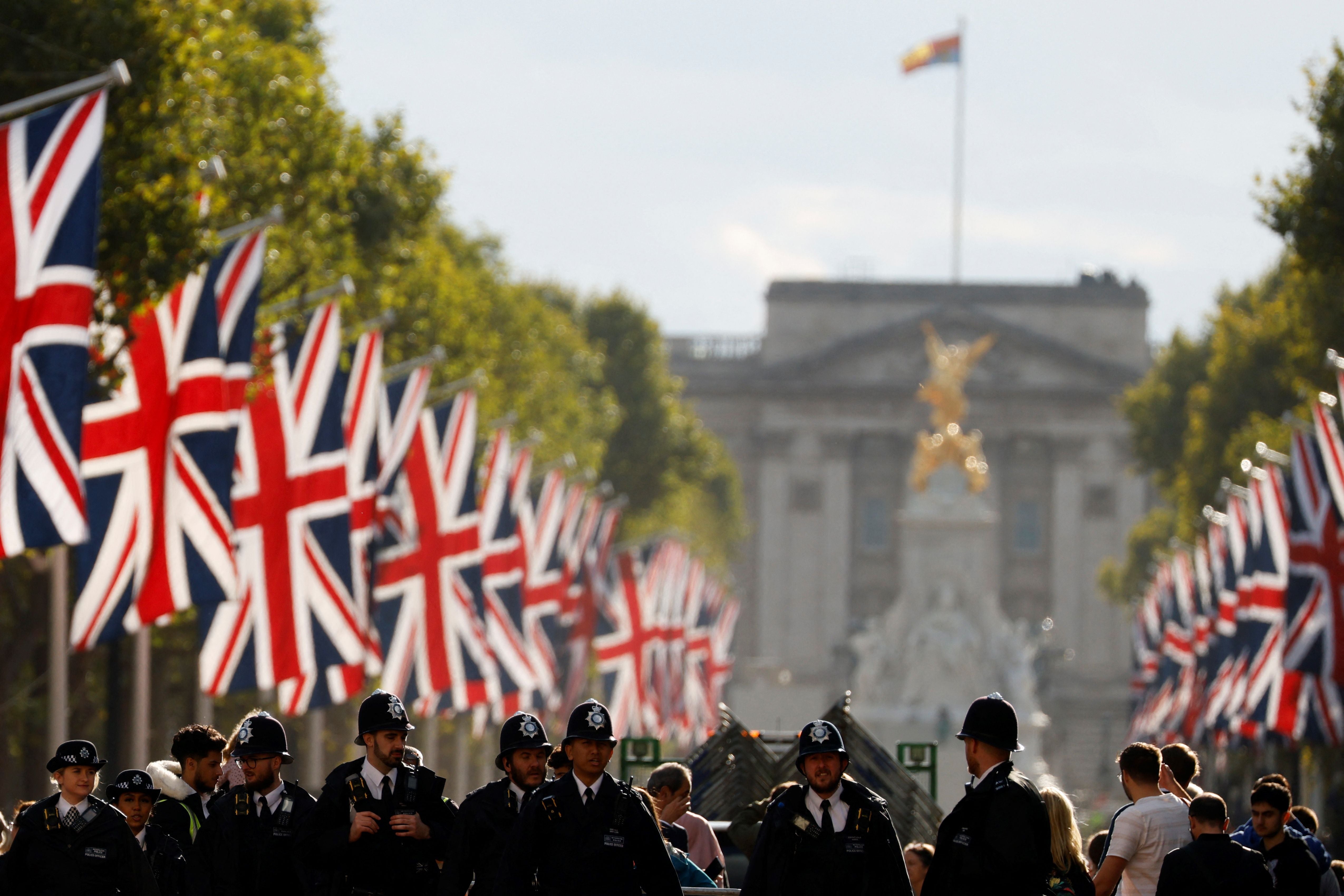 Police officers patrol as members of the public gather outside of Buckingham Palace on September 18, 2022