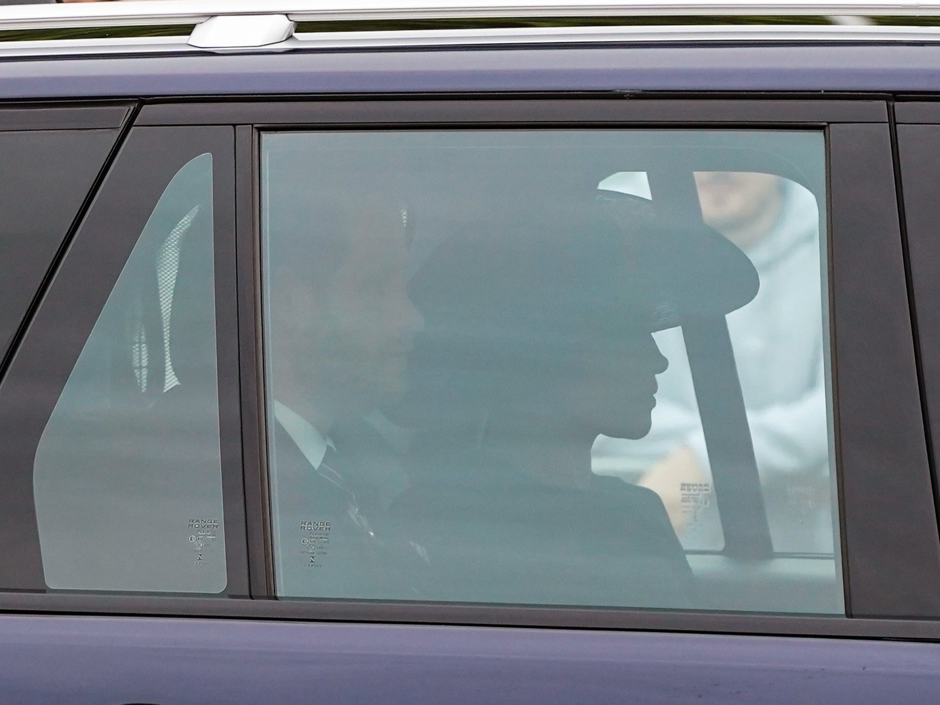 Prince Harry, Duke of Sussex and Meghan, Duchess of Sussex are seen on The Mall ahead of The State Funeral of Queen Elizabeth II