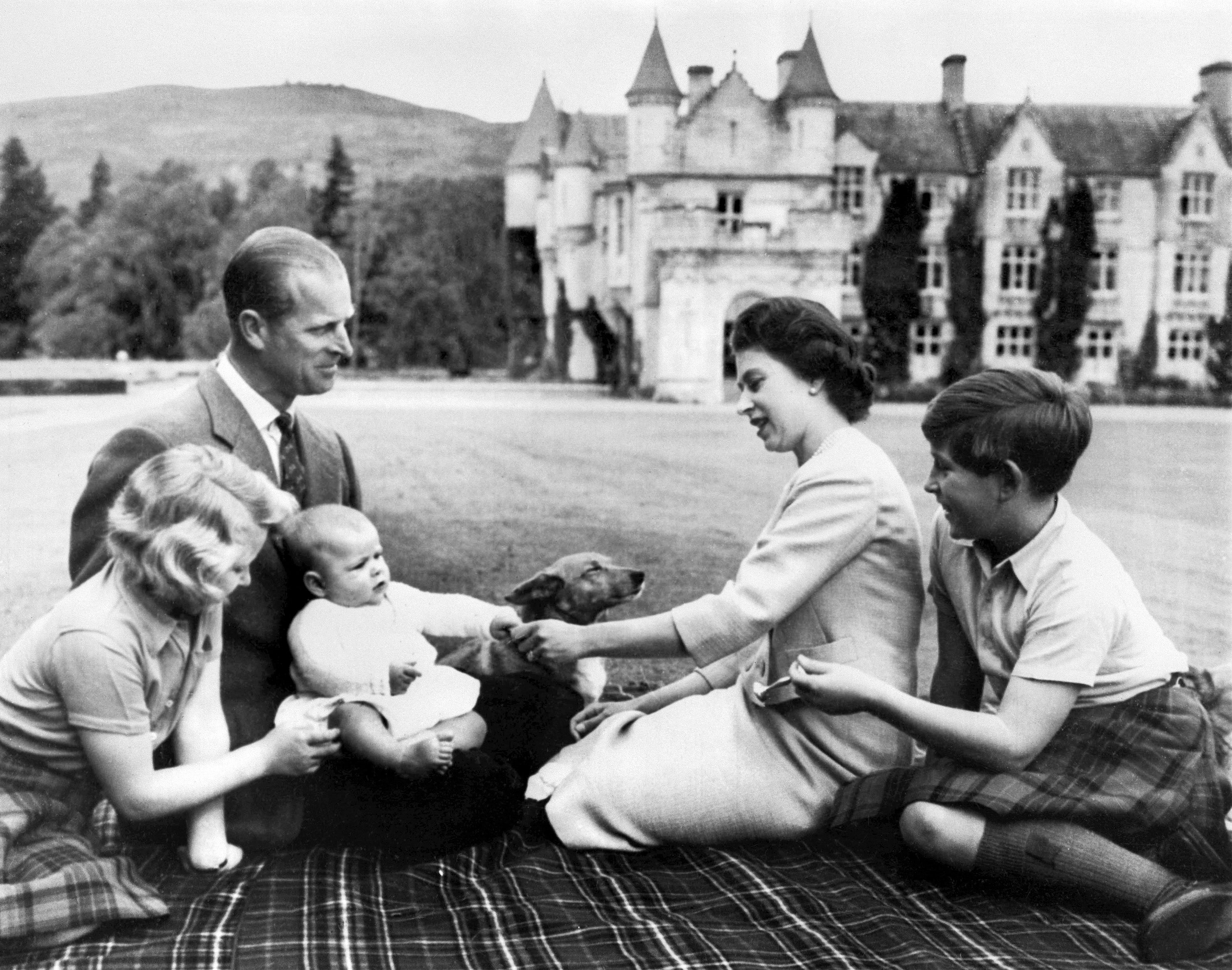 Queen Elizabeth II, Prince Philip and the young Charles, Anne and Andrew pose in the grounds of Balmoral in September 1960