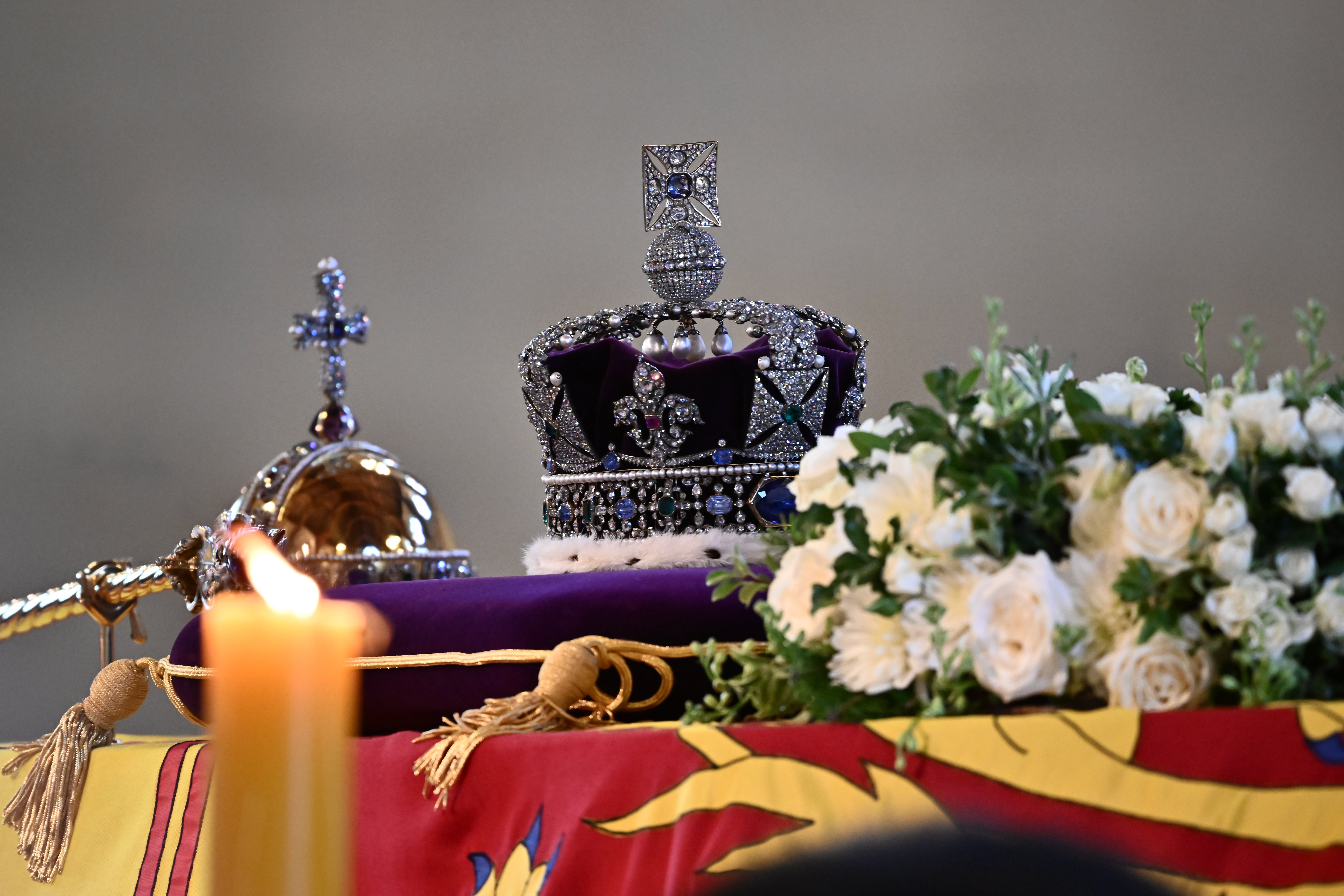 The coffin of Queen Elizabeth II, draped in a Royal Standard and adorned with the Imperial State Crown with the Imperial State Crown and the Sovereign’s orb and sceptre, is pictured inside at Westminster Hall