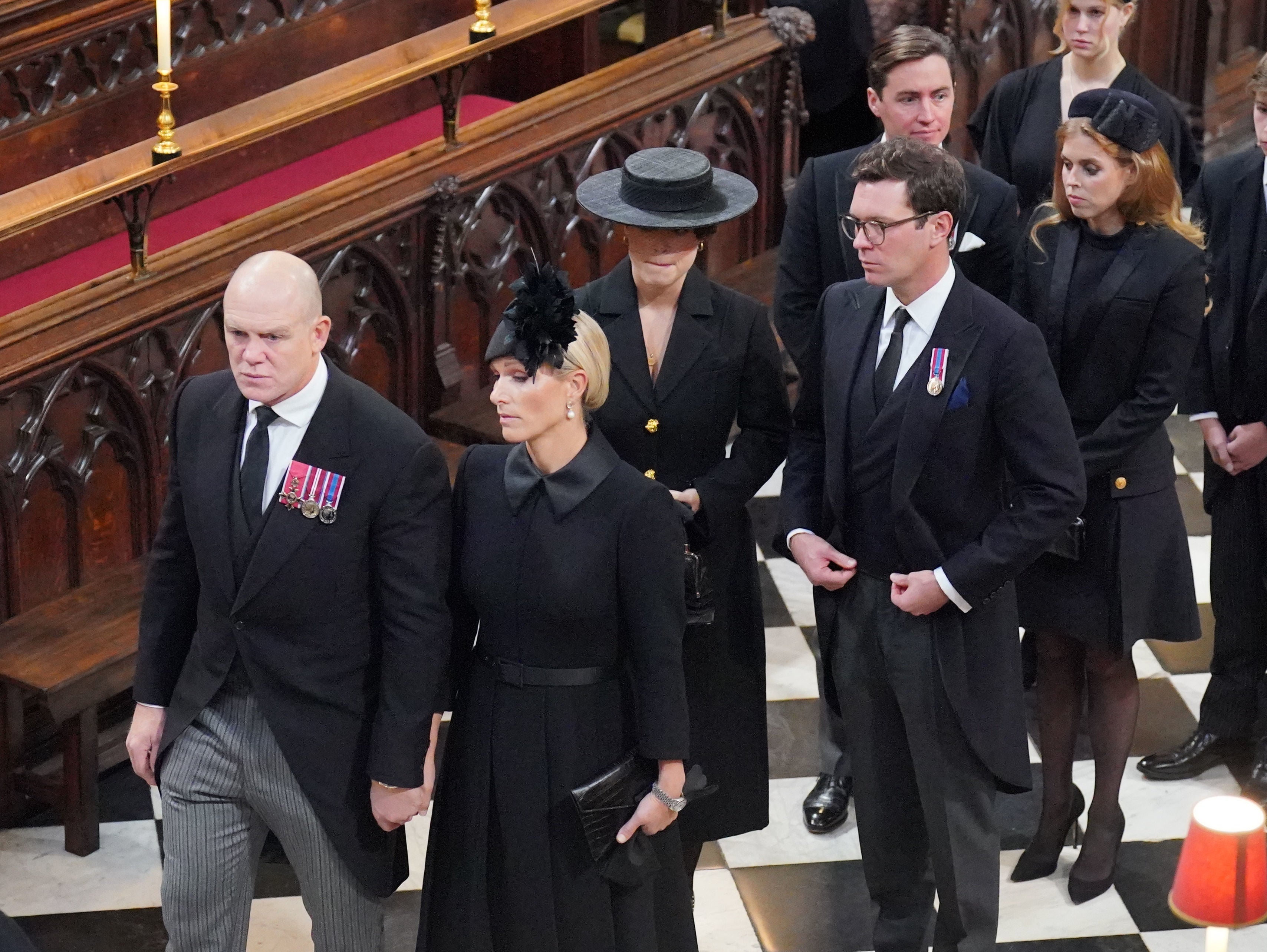 Mike and Zara Tindall and other members of the royal family enter Westminster Abbey for the Queen’s state funeral