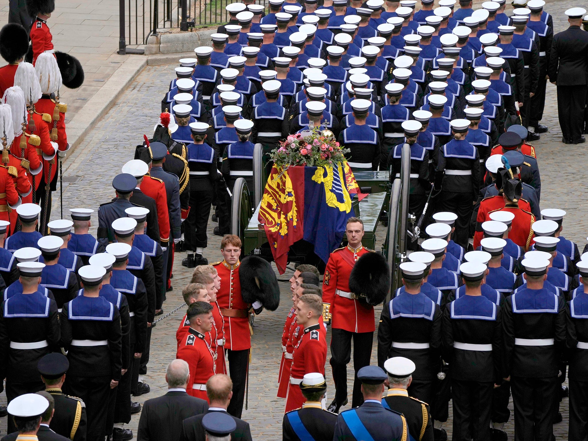 The coffin of Queen Elizabeth II is loaded on to a gun carriage pulled by Royal Navy soldiers to go from Westminster Hall to the State Funeral, held at Westminster Abbey, London.