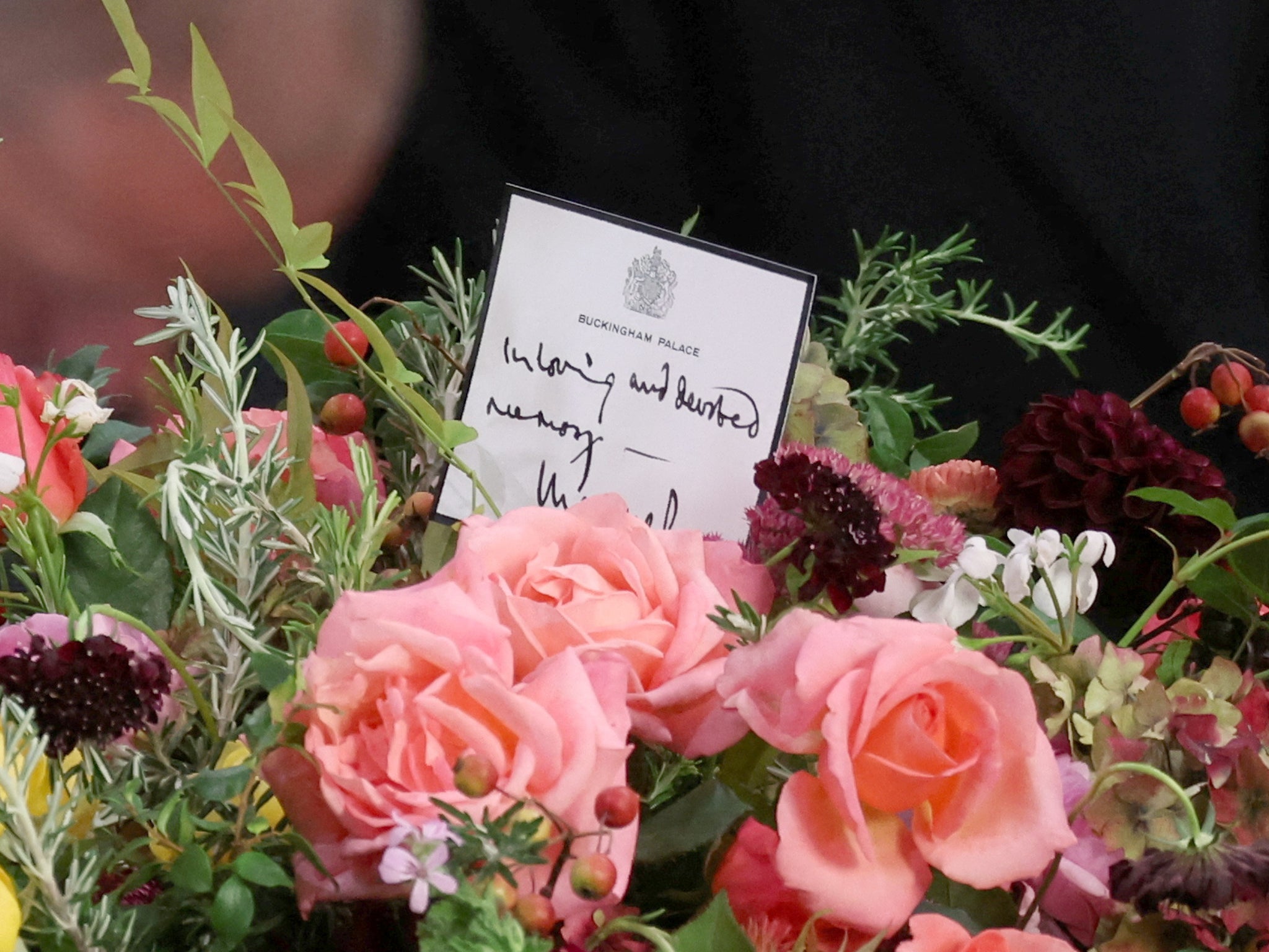 The handwritten note on the wreath on top of the Queen’s coffin