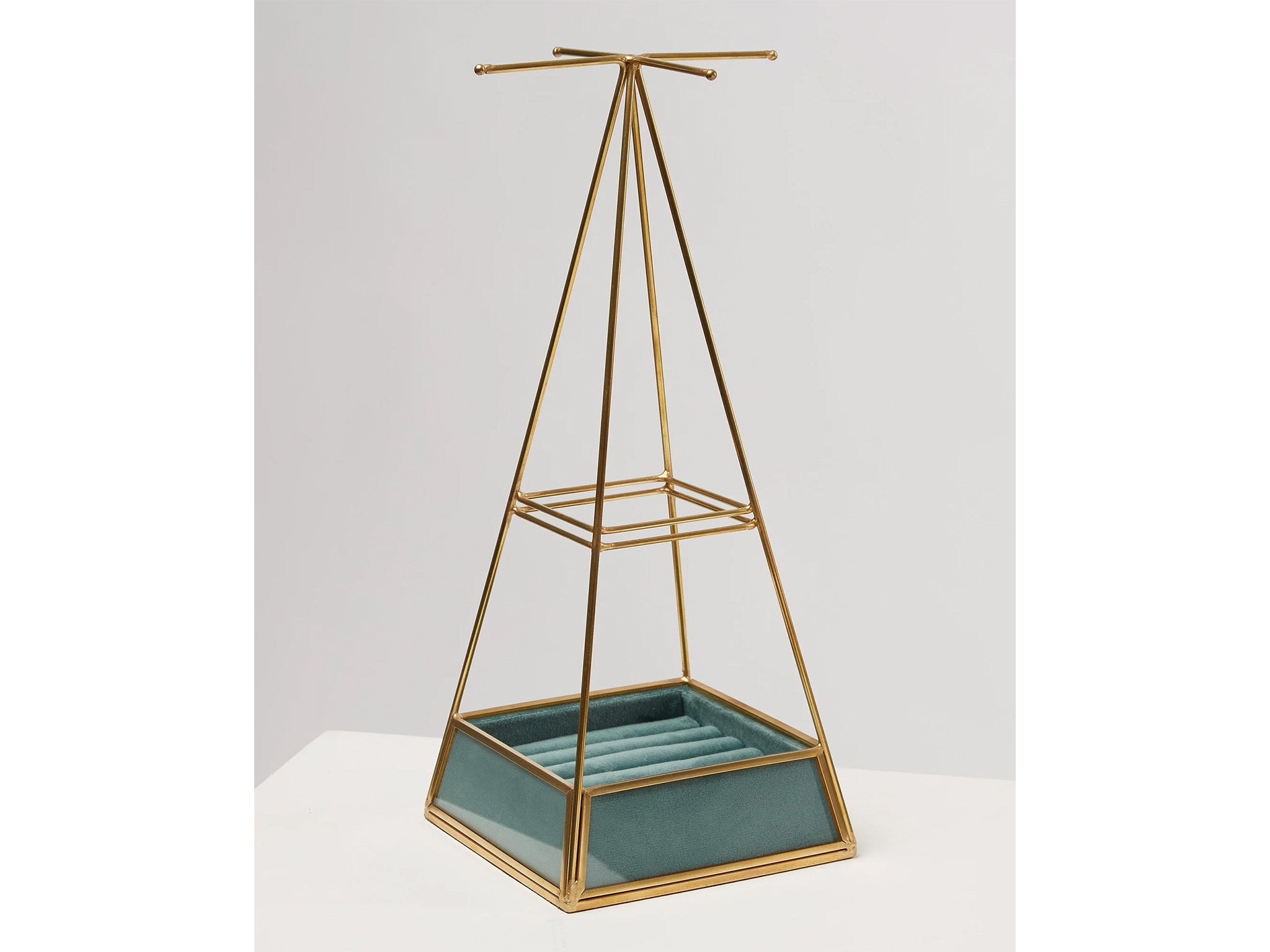 Oliver Bonas gold and glass pyramid blue velvet jewellery holder