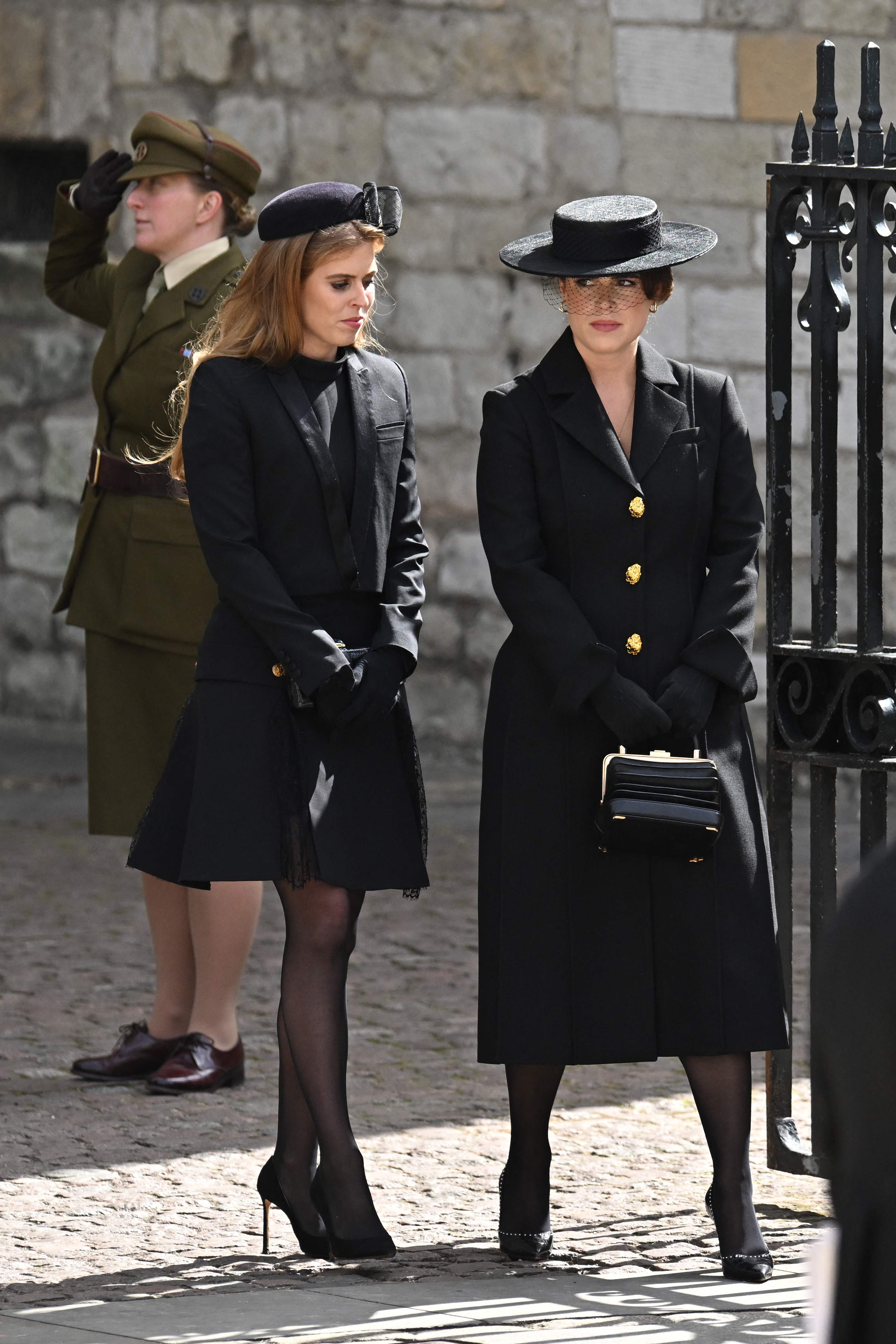 Princesses Beatrice and Eugenie leave Westminster Abbey in London after the Queen’s funeral