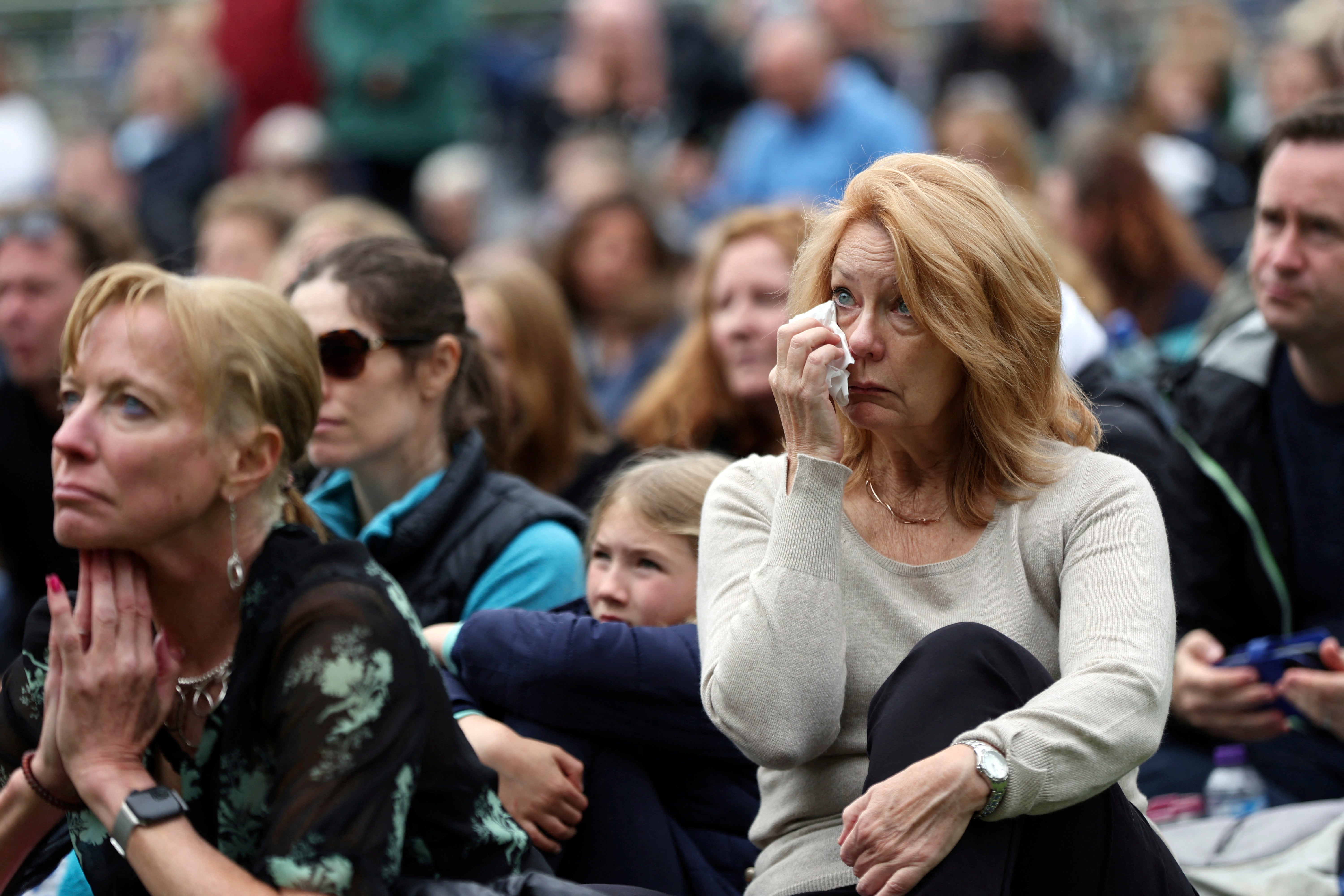 Tearful crowds lined the route of the funeral procession