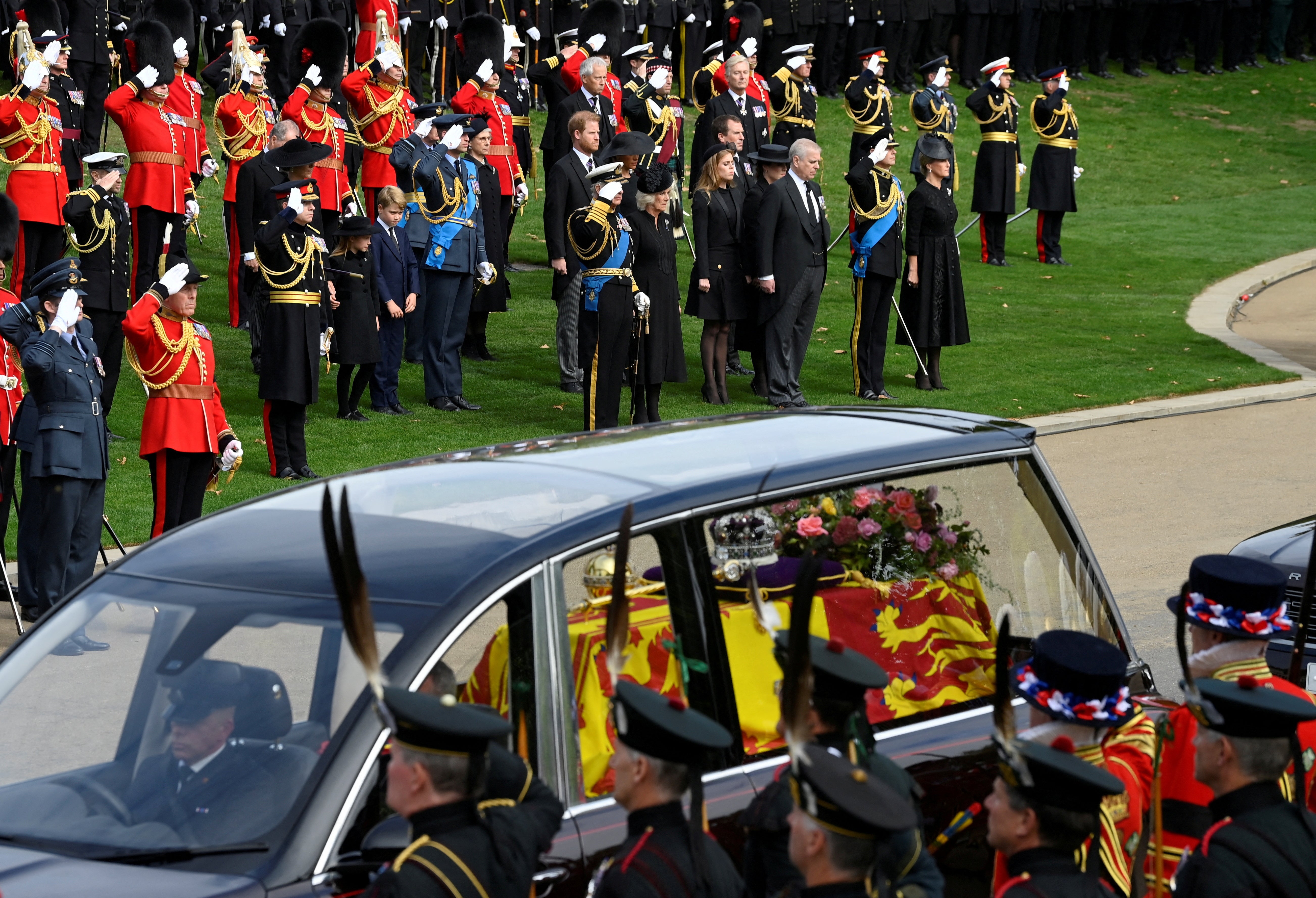 Members of the royal family pay their respects to the Queen.