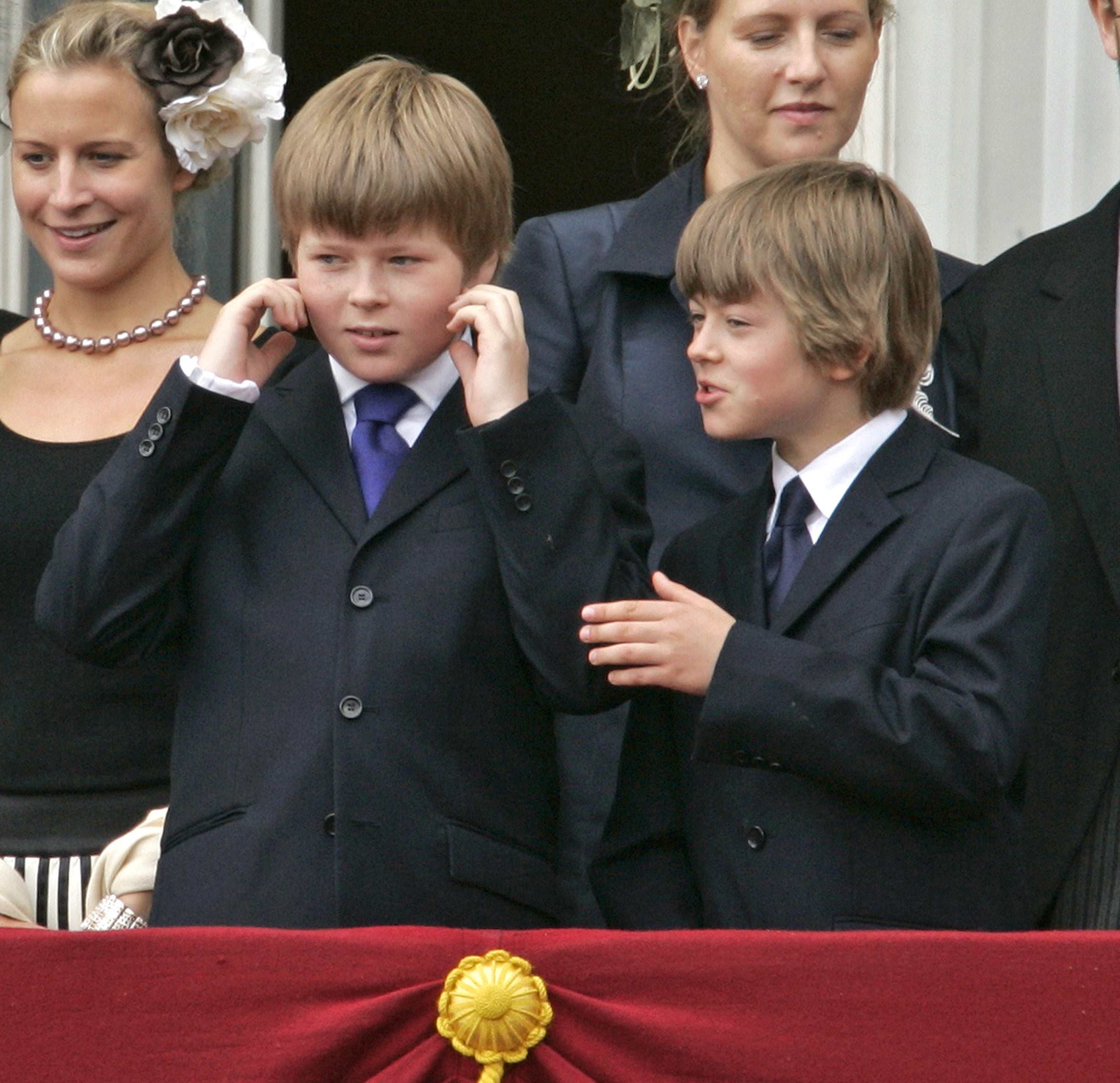 Columbus and Cassius Taylor stand on the balcony of Buckingham Palace during the Trooping the Colour parade in 2007