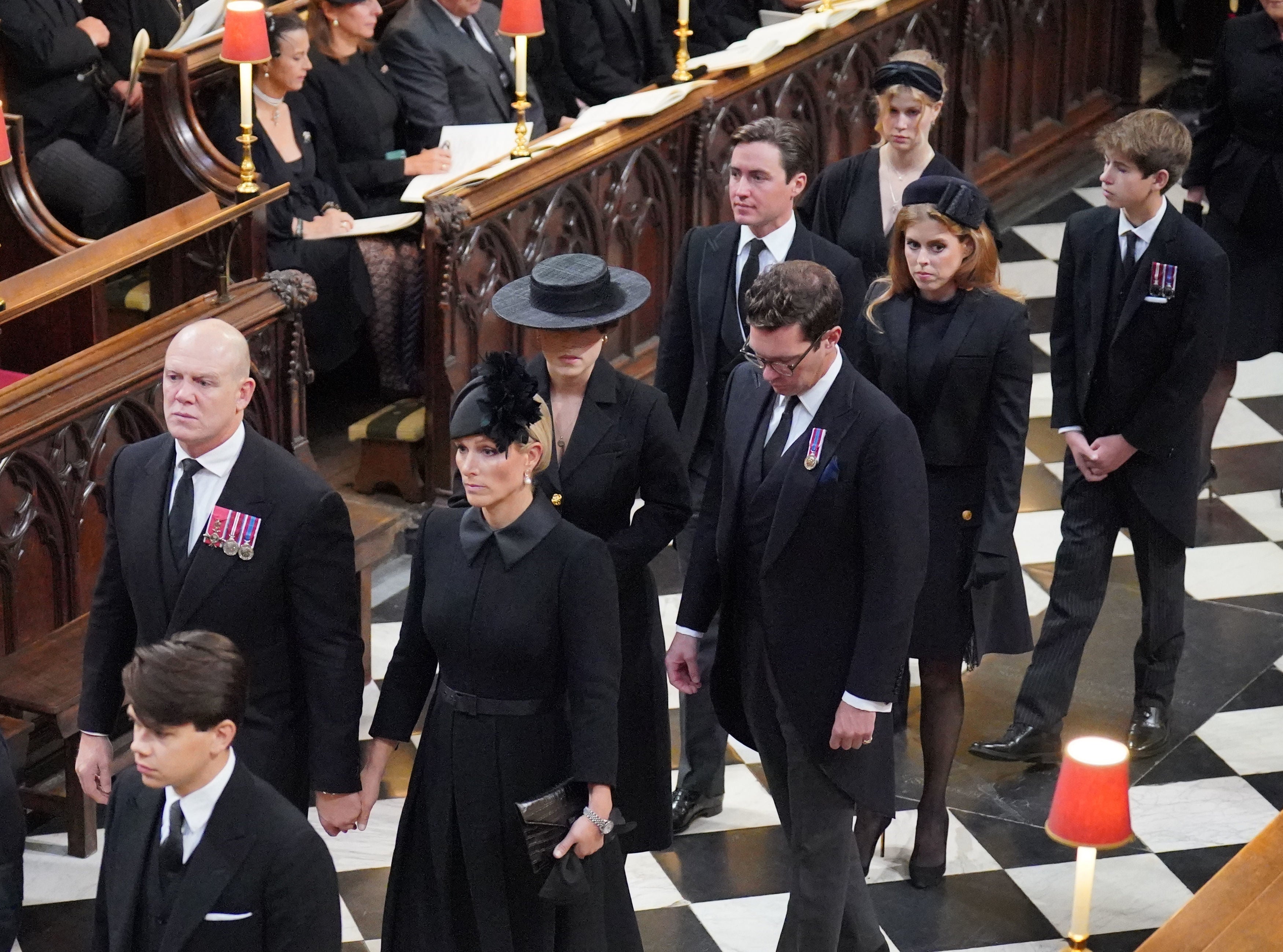 Zara Tindall and husband Mike Tindall hold hands inside Westminster Abbey