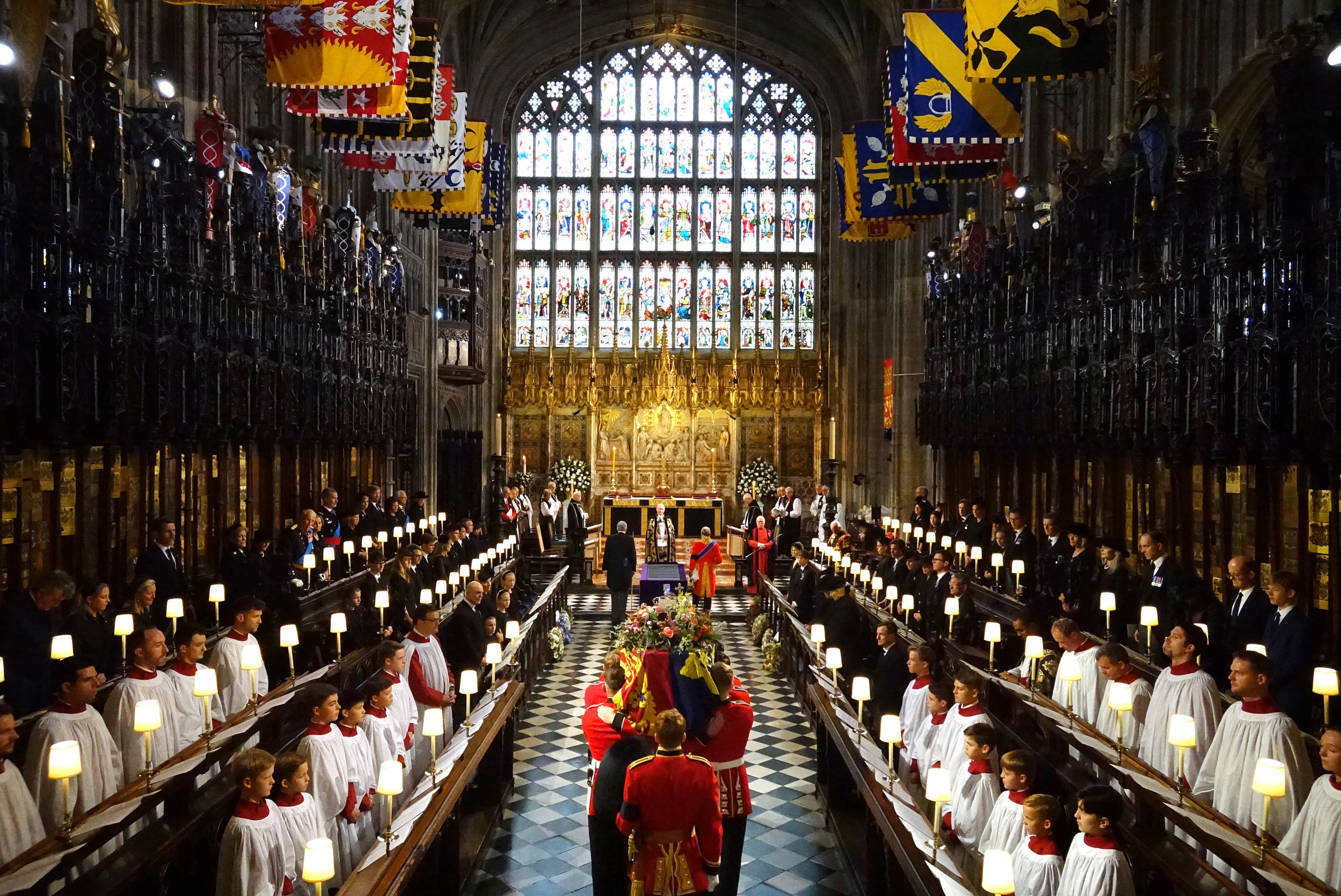 The coffin of Queen Elizabeth II is carried into St George’s Chapel