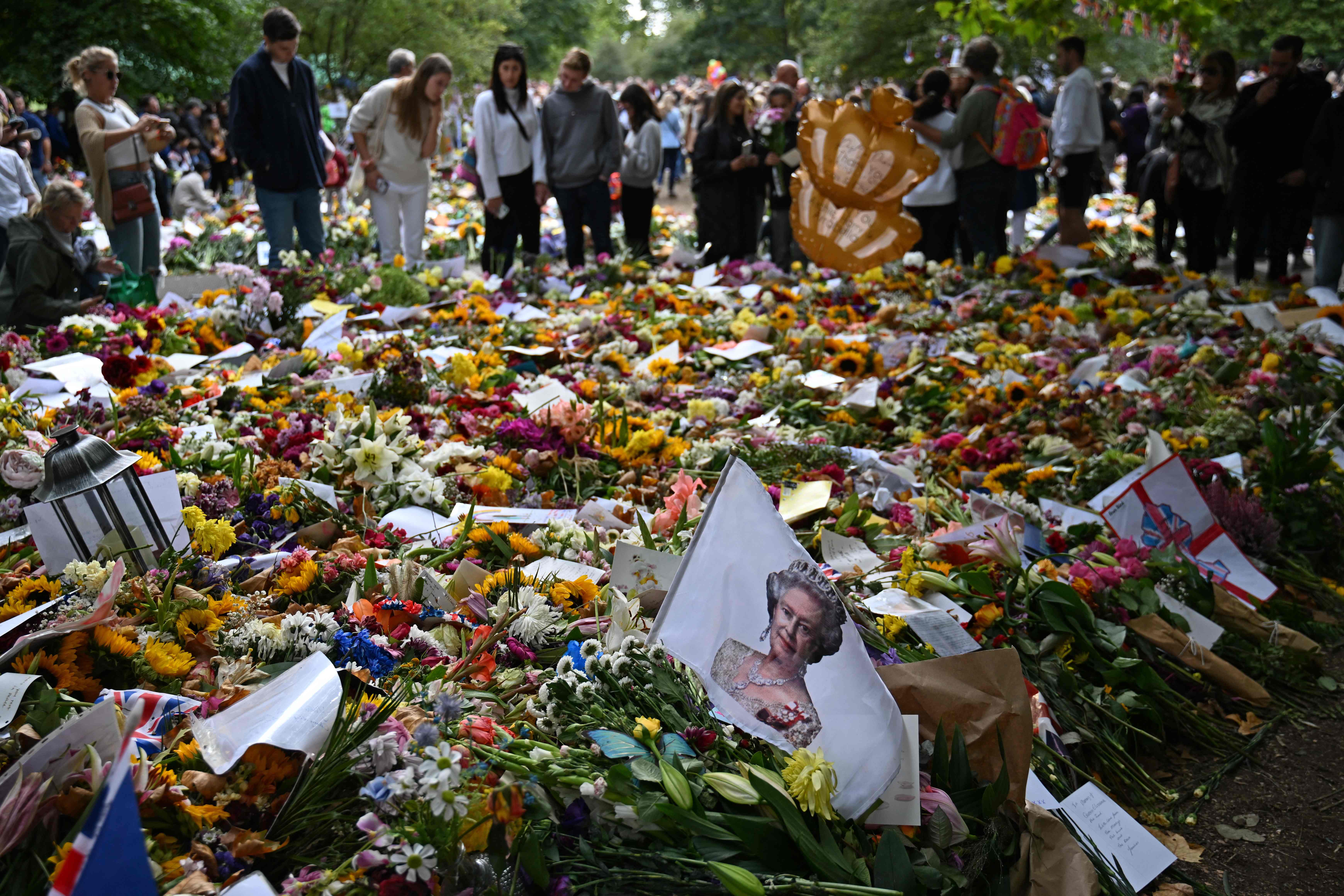 Flowers and tributes left in Green Park, near Buckingham Palace