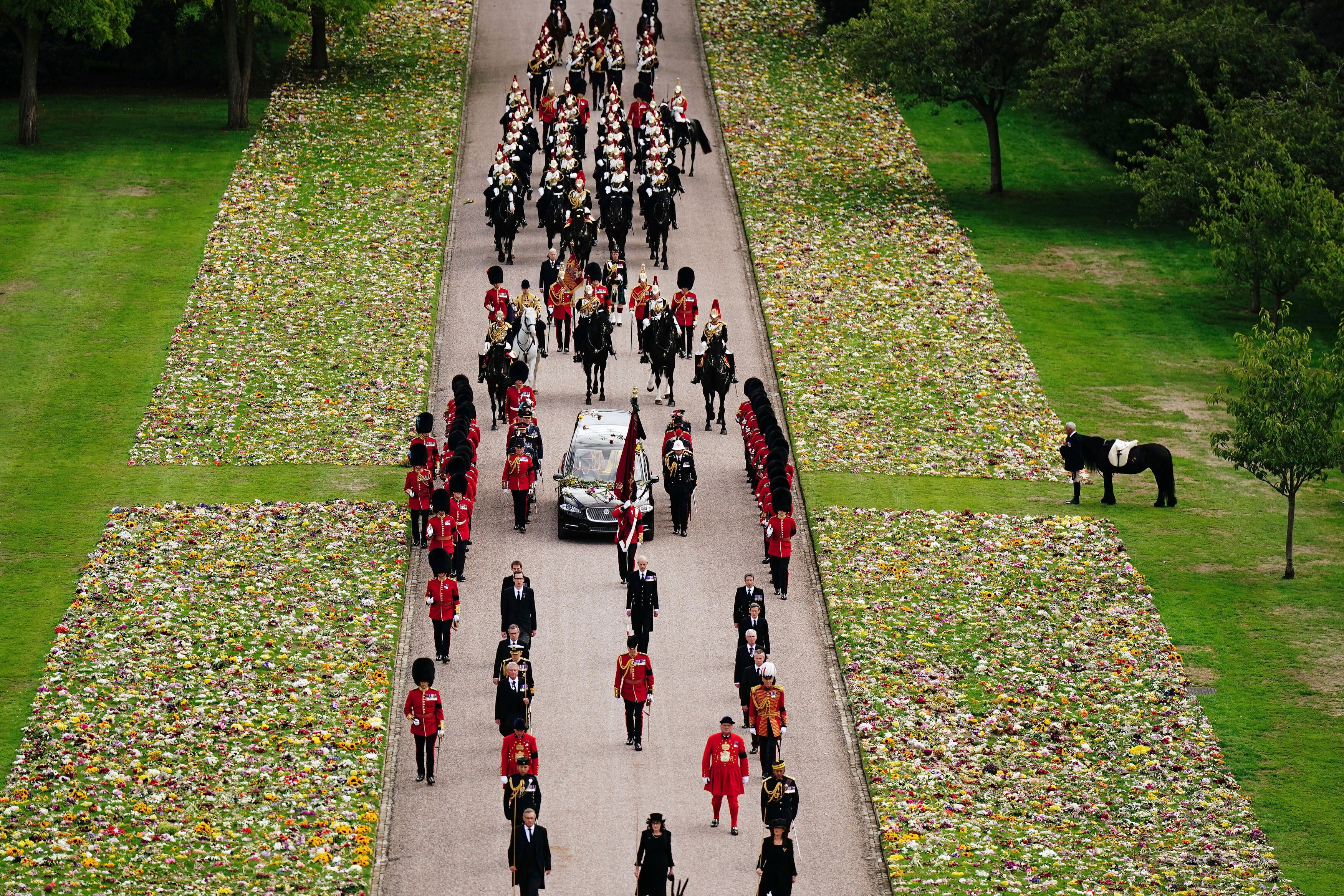 Emma, the monarch’s fell pony, stands as the Ceremonial Procession of the coffin of Queen Elizabeth II arrives at Windsor Castle.