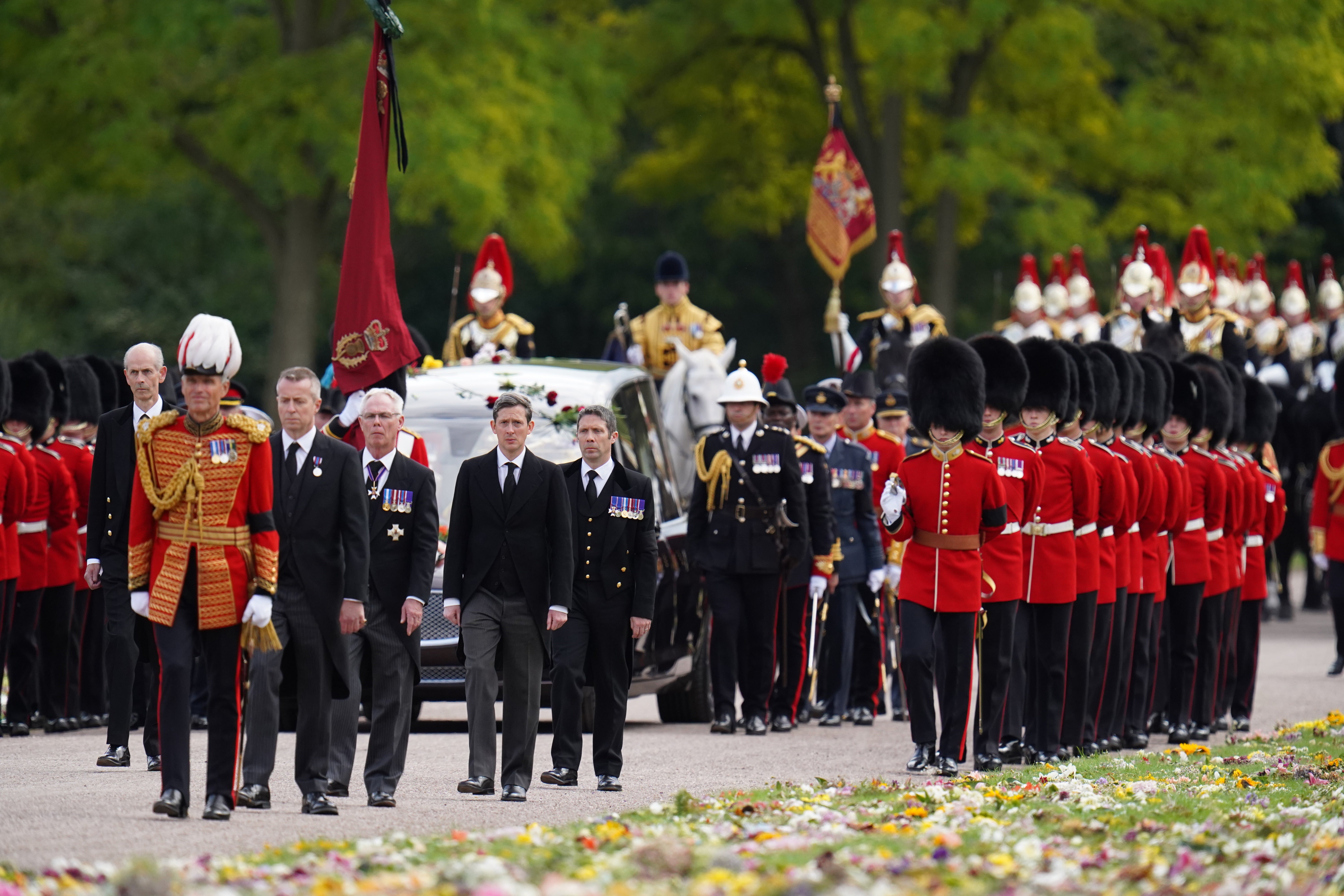 Parents have described the moment they saw their children accompany the Queen’s coffin during her funeral procession (Andrew Matthews/PA)