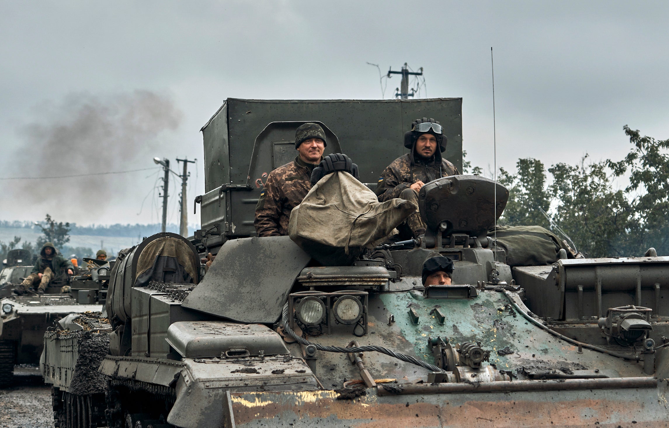 Ukrainian military vehicles in the Kharkiv region (Kostiantyn Liberov/AP)