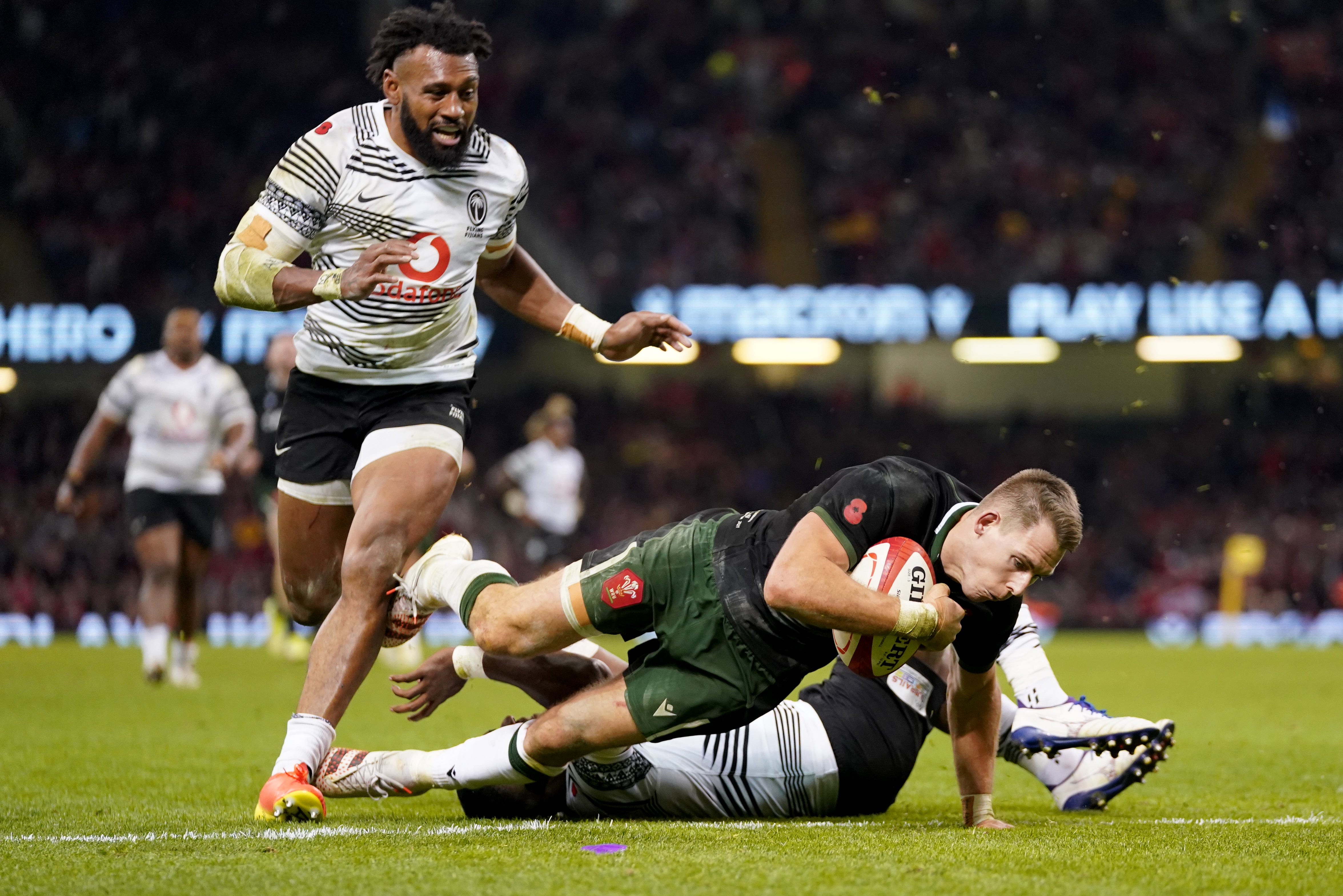 Liam Williams in try-scoring action for Wales (David Davies/PA)