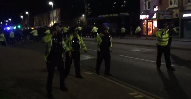 Police tried to disperse a mob throwing glass bottles in Leicester during unrest