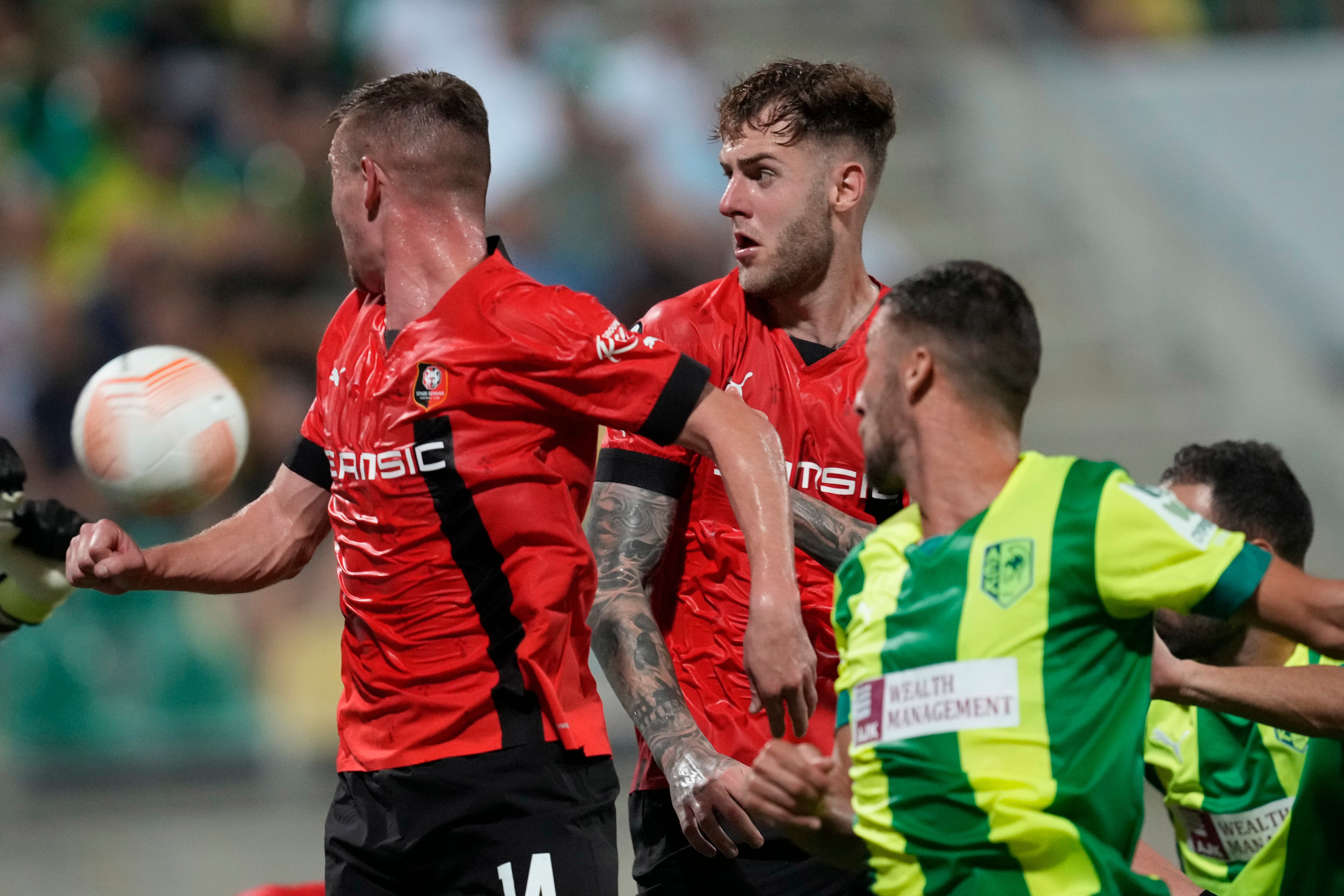 Joe Rodon, centre, in action for Rennes against AEK Larnaca in the Europa League, has settled in well at his new French club (Petros Karadjias/AP)