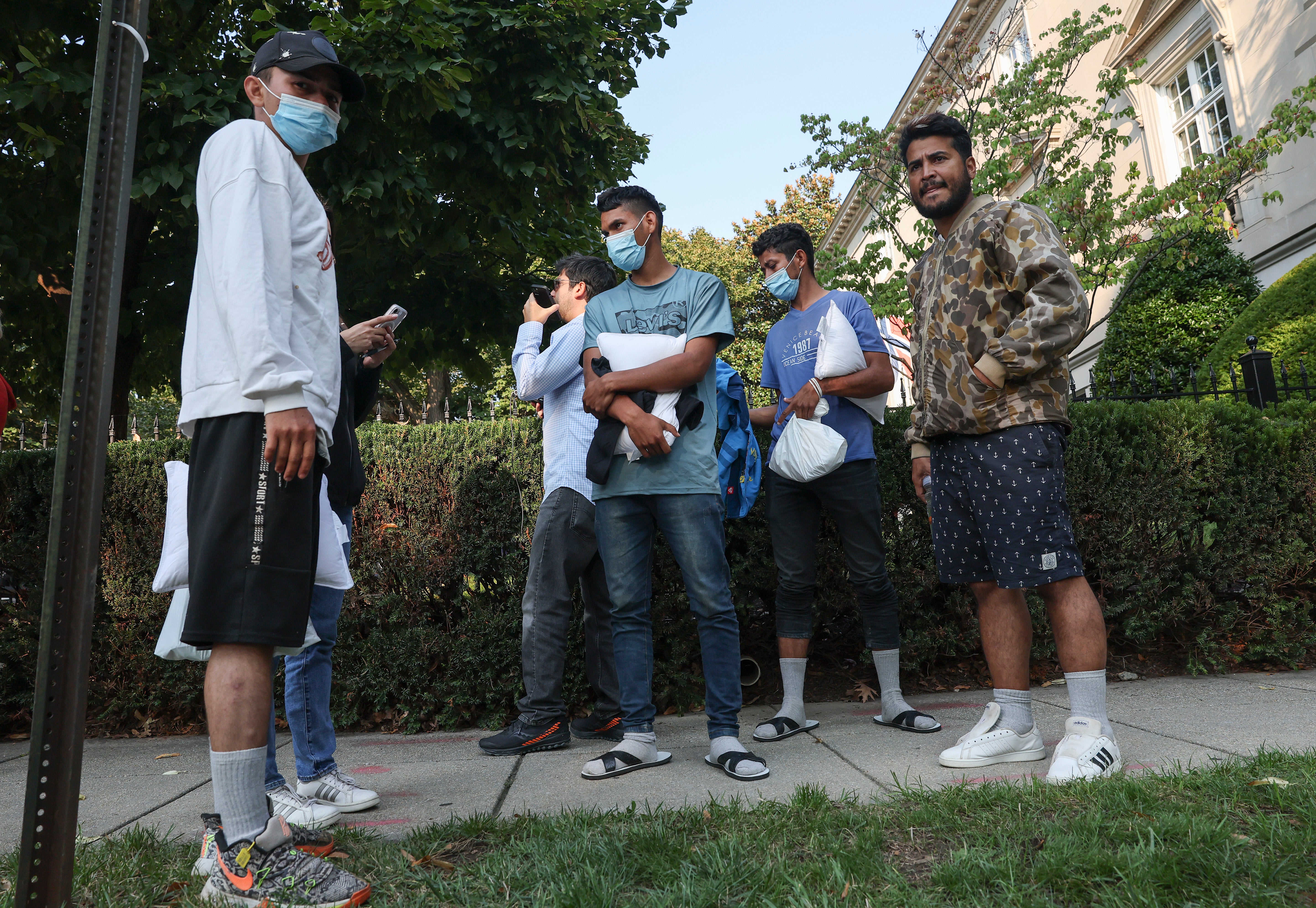 Migrants sent from Texas were dropped off outside Vice President Kamala Harris’s residence in Washington DC on 15 September.