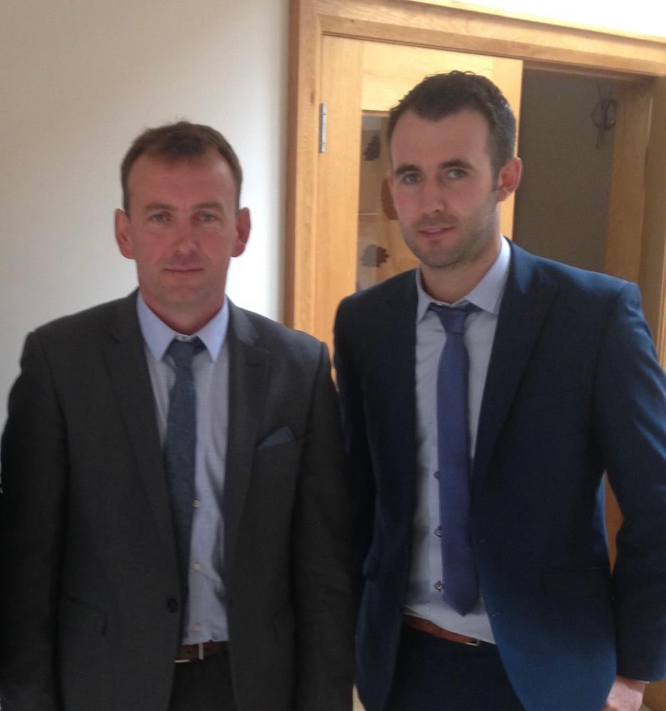 Passing down the burden: Damian with his son Damán