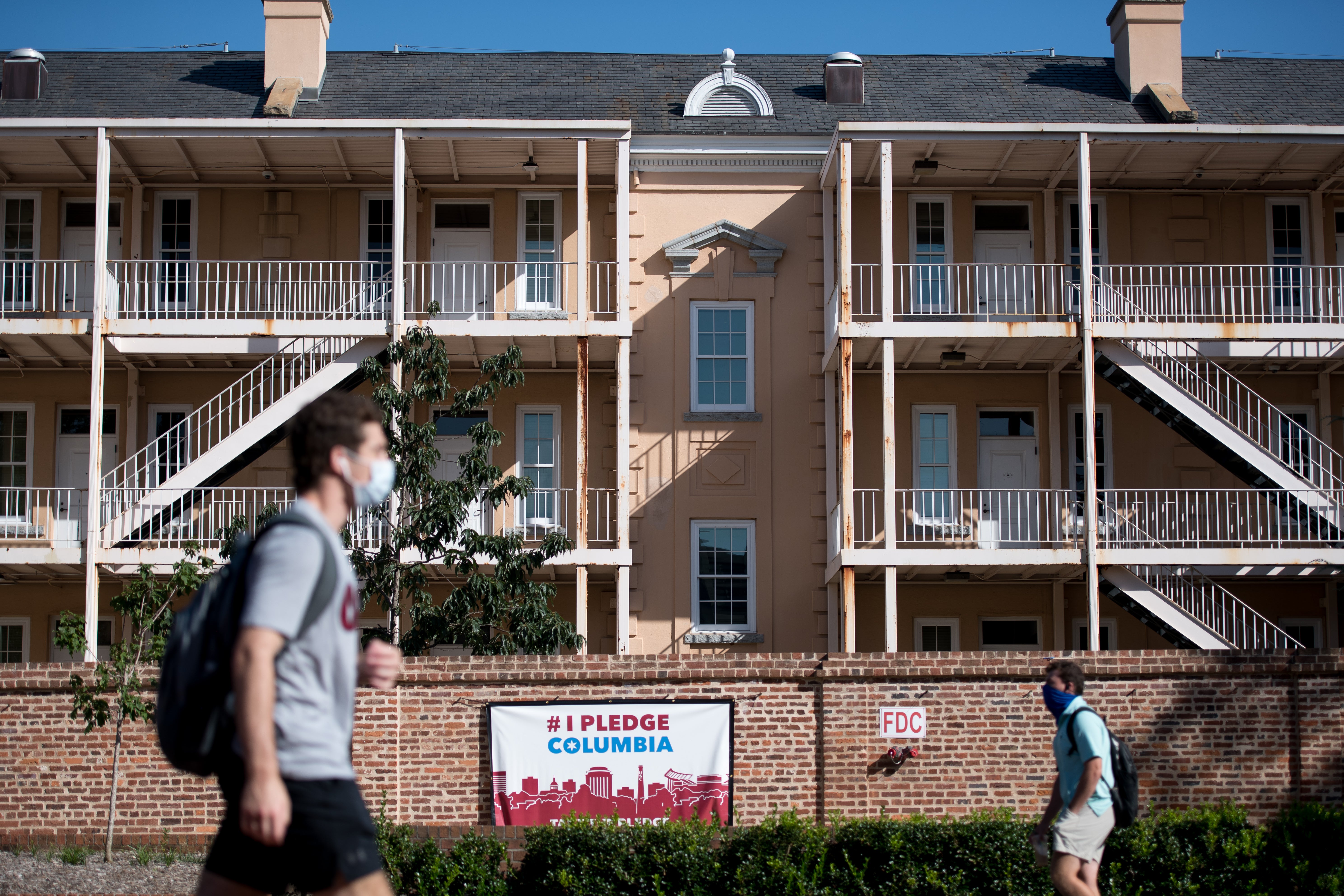 File: Students walk on campus at the University of South Carolina in Columbia