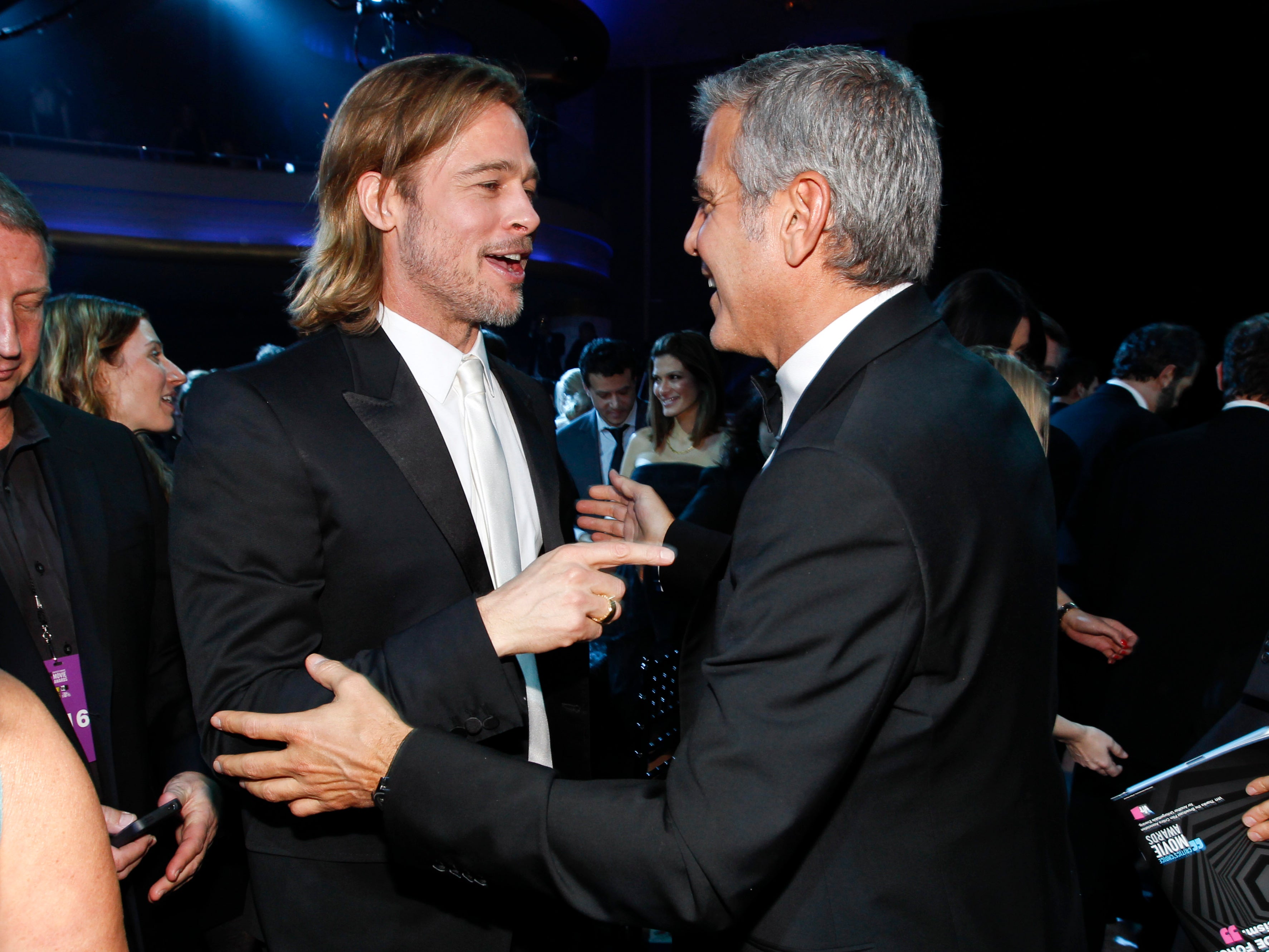 Brad Pitt and George Clooney attend the 17th Annual Critics' Choice Movie Awards held at The Hollywood Palladium on January 12, 2012