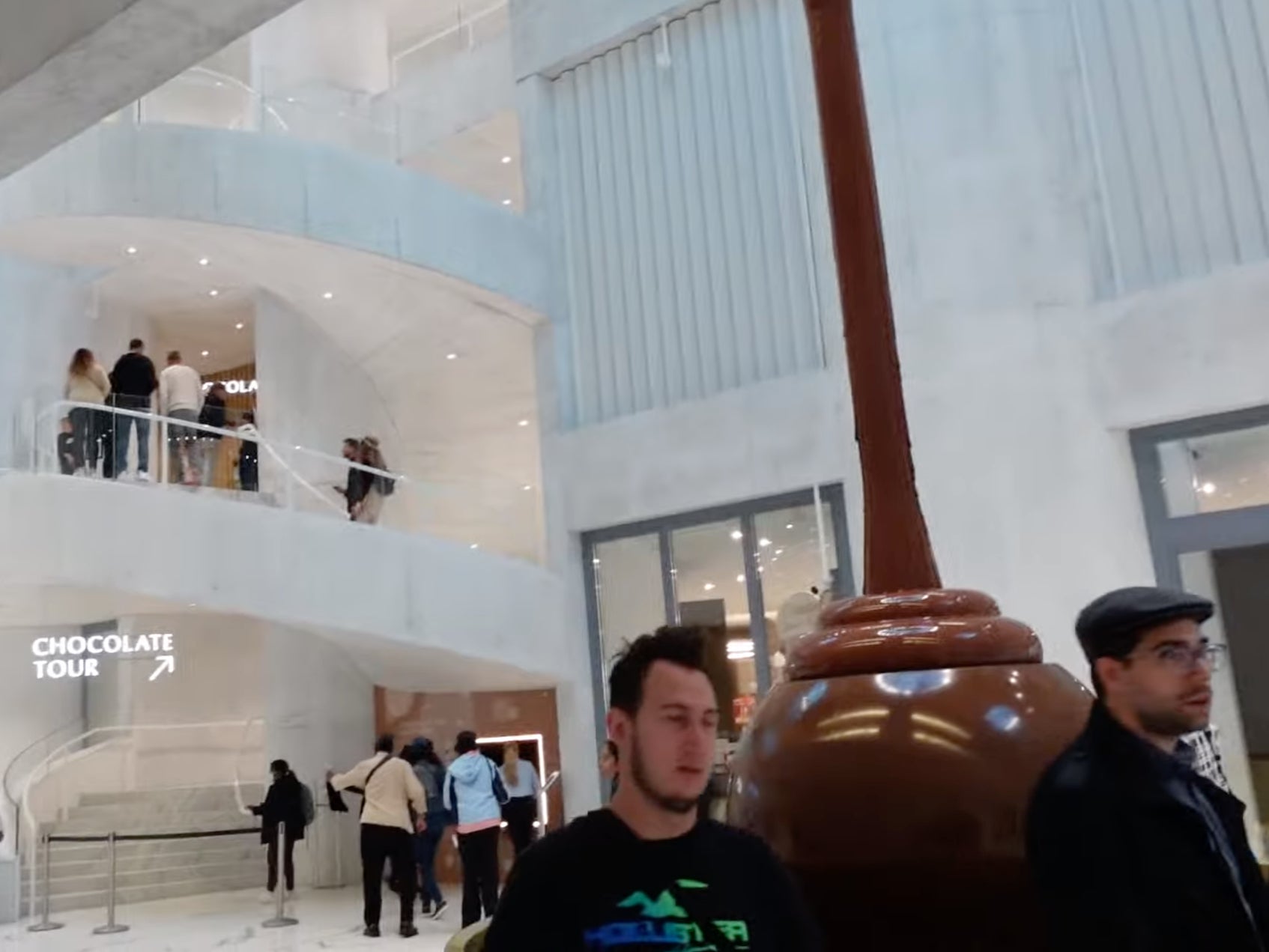 Hague gives viewers a sneak peek at the towering chocolate fountain inside the factory