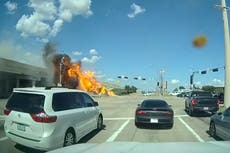 Truck driver killed after vehicle veers off overpass and bursts into flames