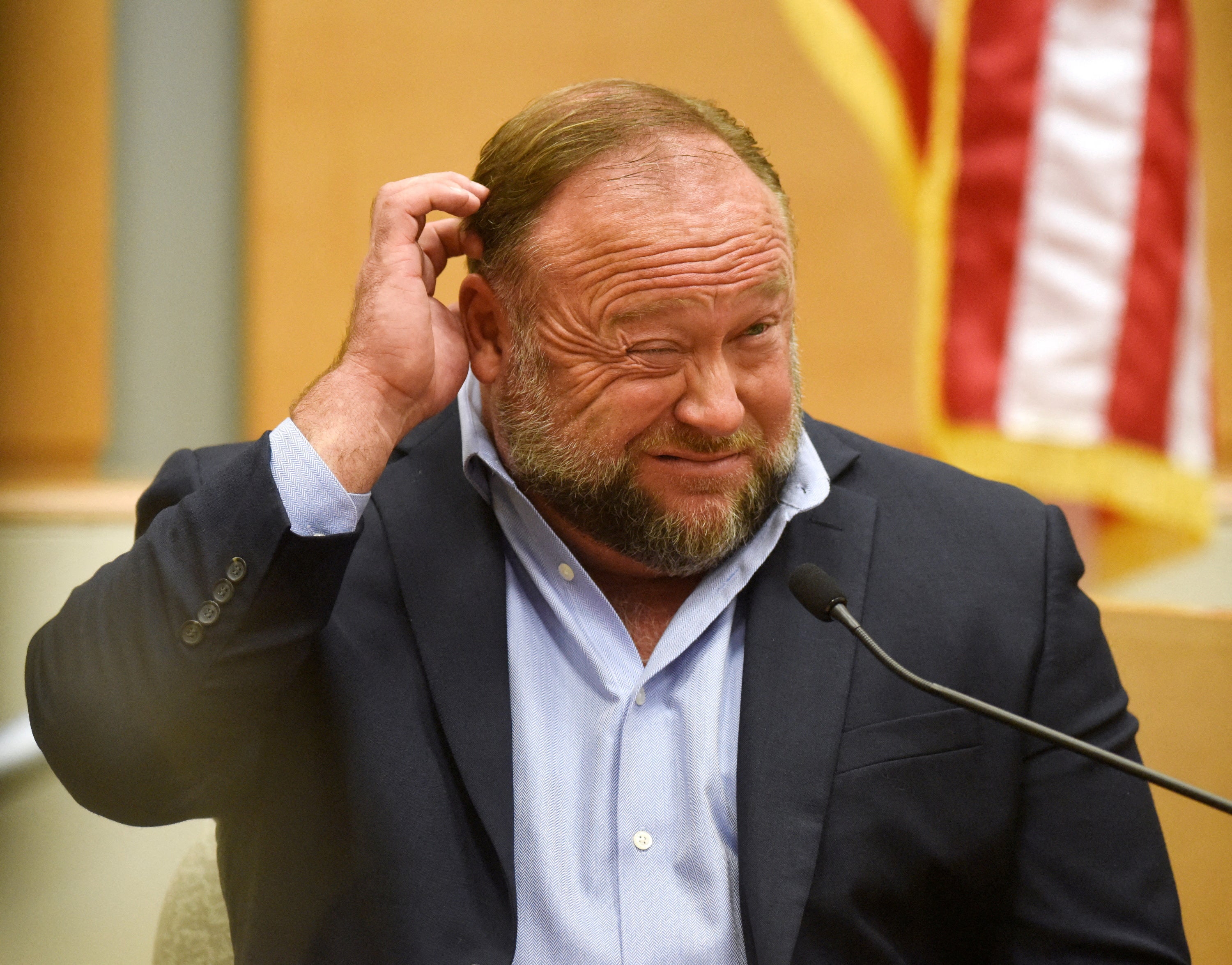 Infowars founder Alex Jones takes the witness stand to testify