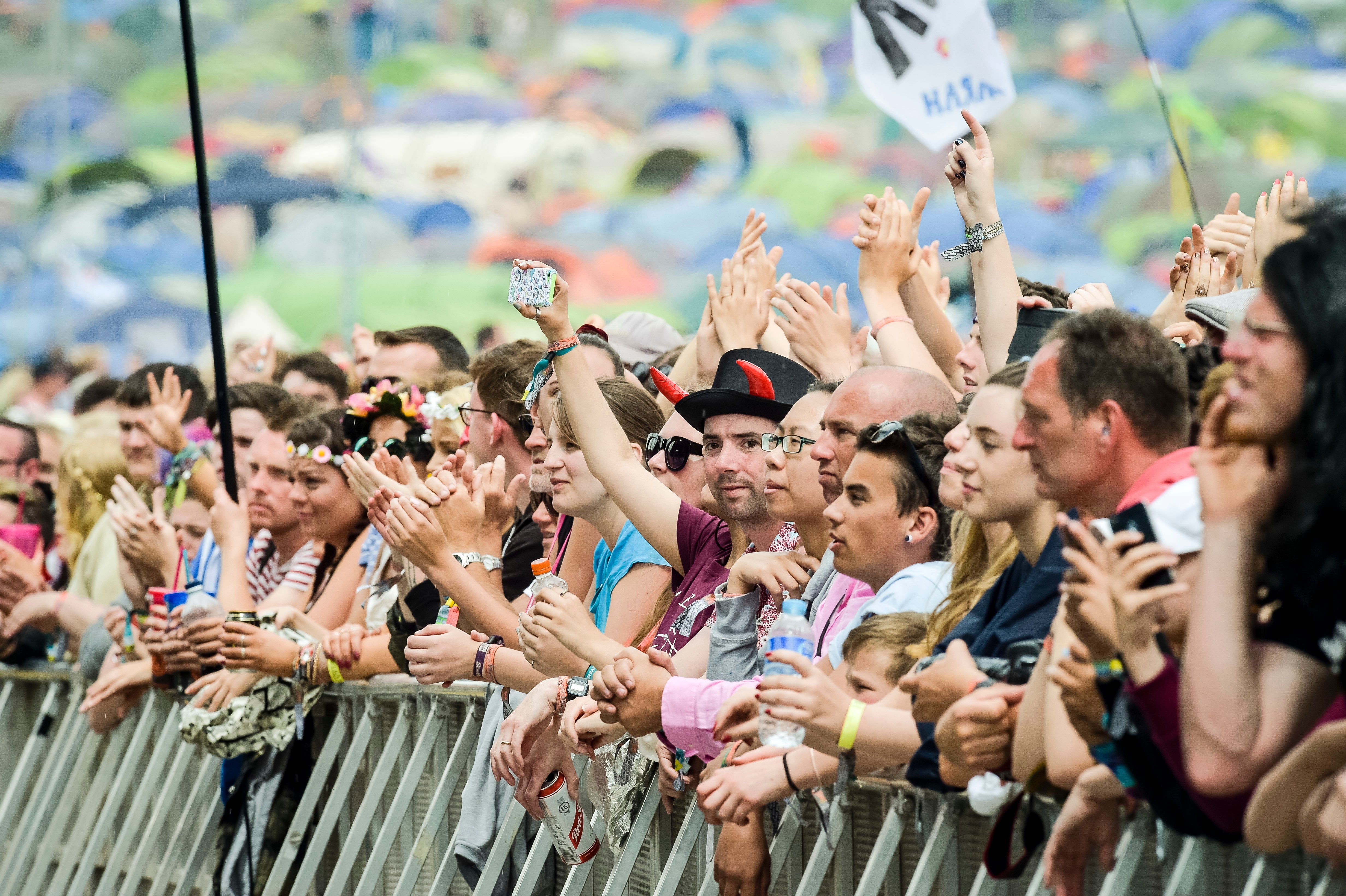 Festival-goers (Ben Birchall/PA)