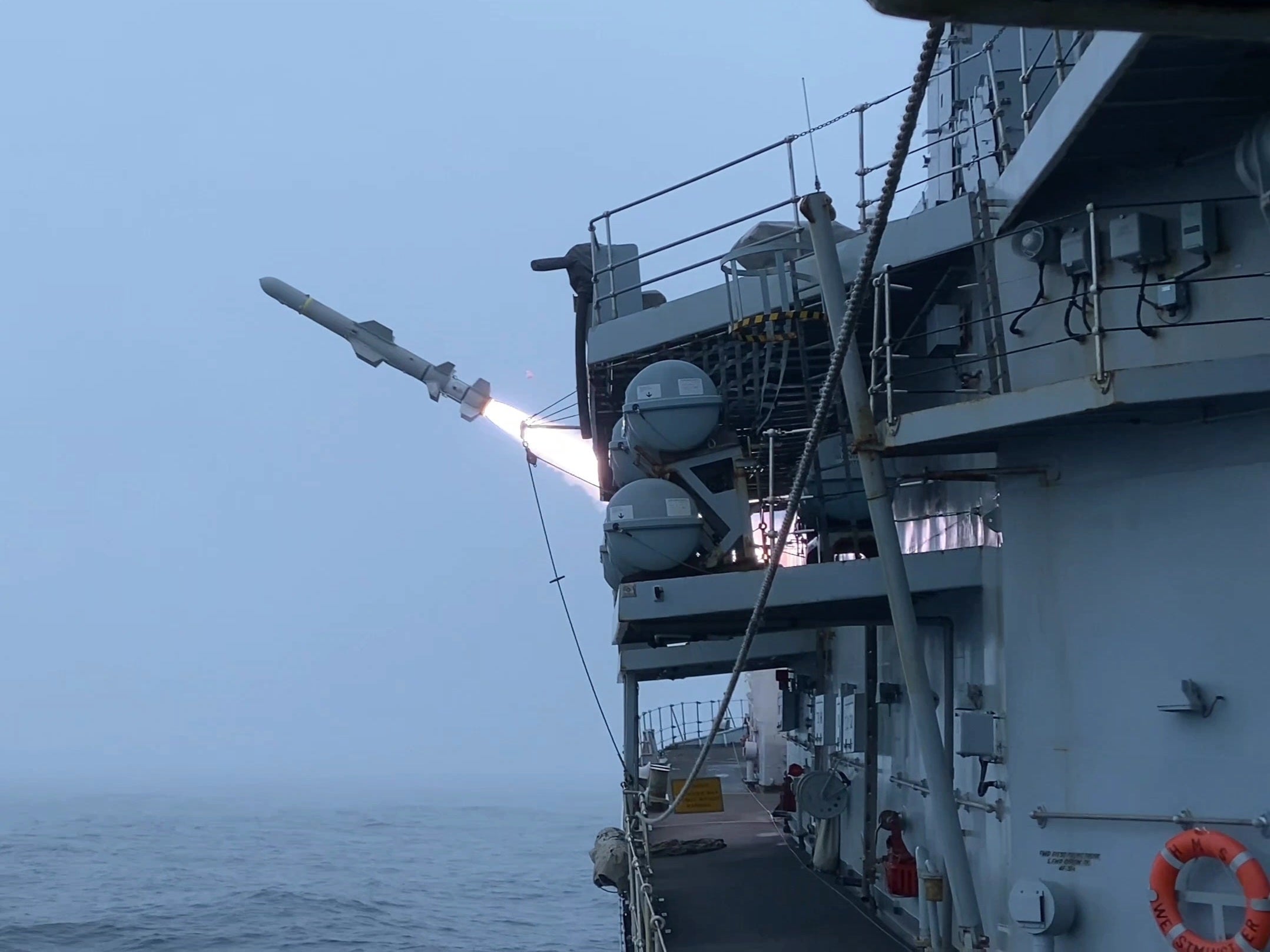 HMS Westminster firing Harpoon missiles at ex-USS Boone (MoD/Crown Copyright/PA)