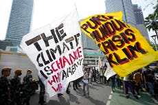 Protesters fear climate change impacts, demand aid for poor