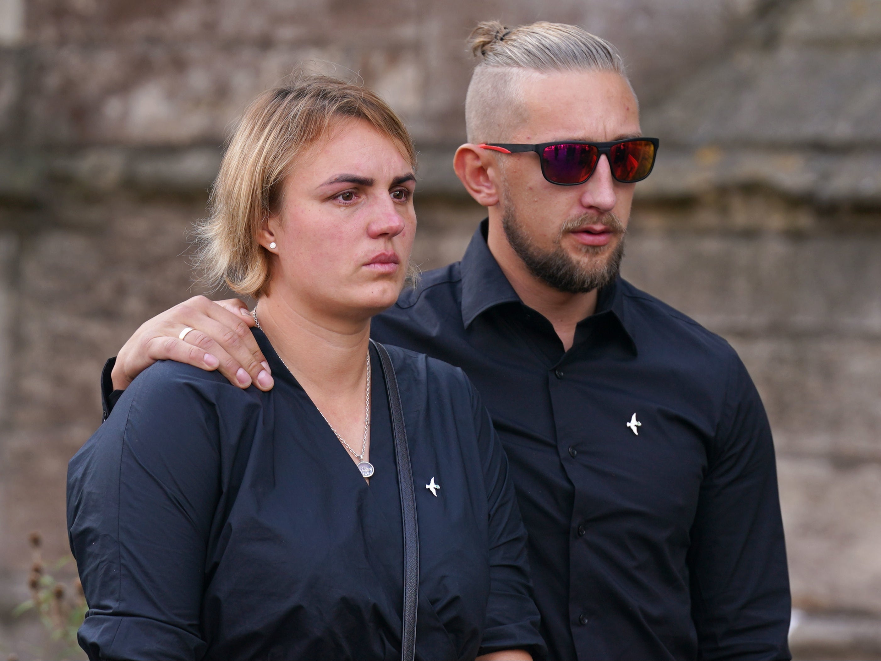 Lilia Valutyte’s mother Lina Savicke and step-father Aurelijus Savickas at her funeral