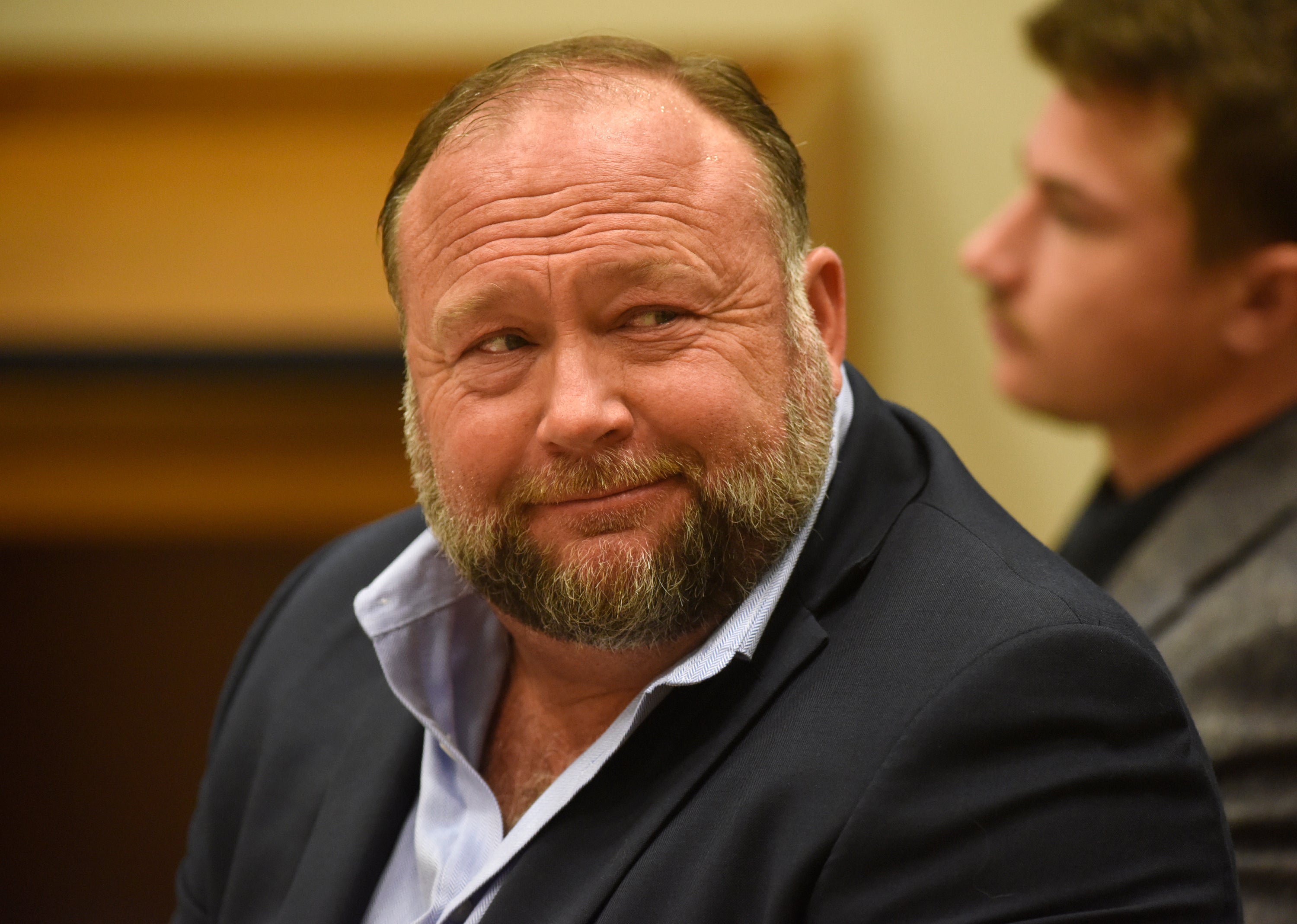 Infowars founder Alex Jones appears in court to testify during the Sandy Hook defamation damages trial in Connecticut