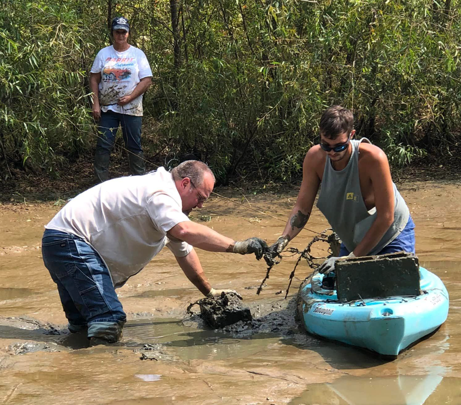 Butler County Coroner Jim Akers and Gage Goodwin retrieving Edward Goodwin’s remains