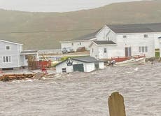 Woman rescued as post-tropical cyclone Fiona washes homes out to sea off Canada coast