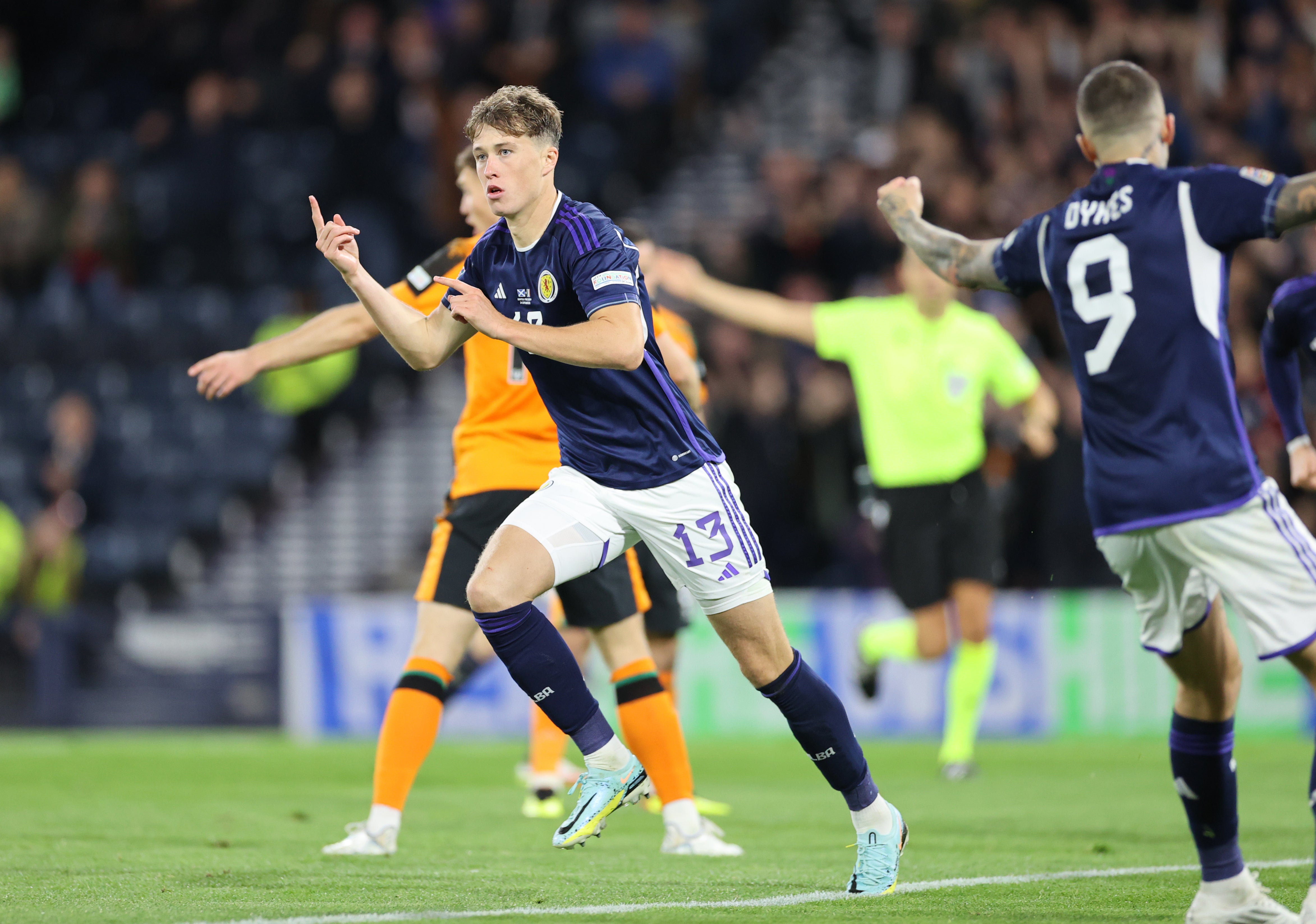 Jack Hendry (left) celebrates drawing Scotland level (Steve Welsh/PA)