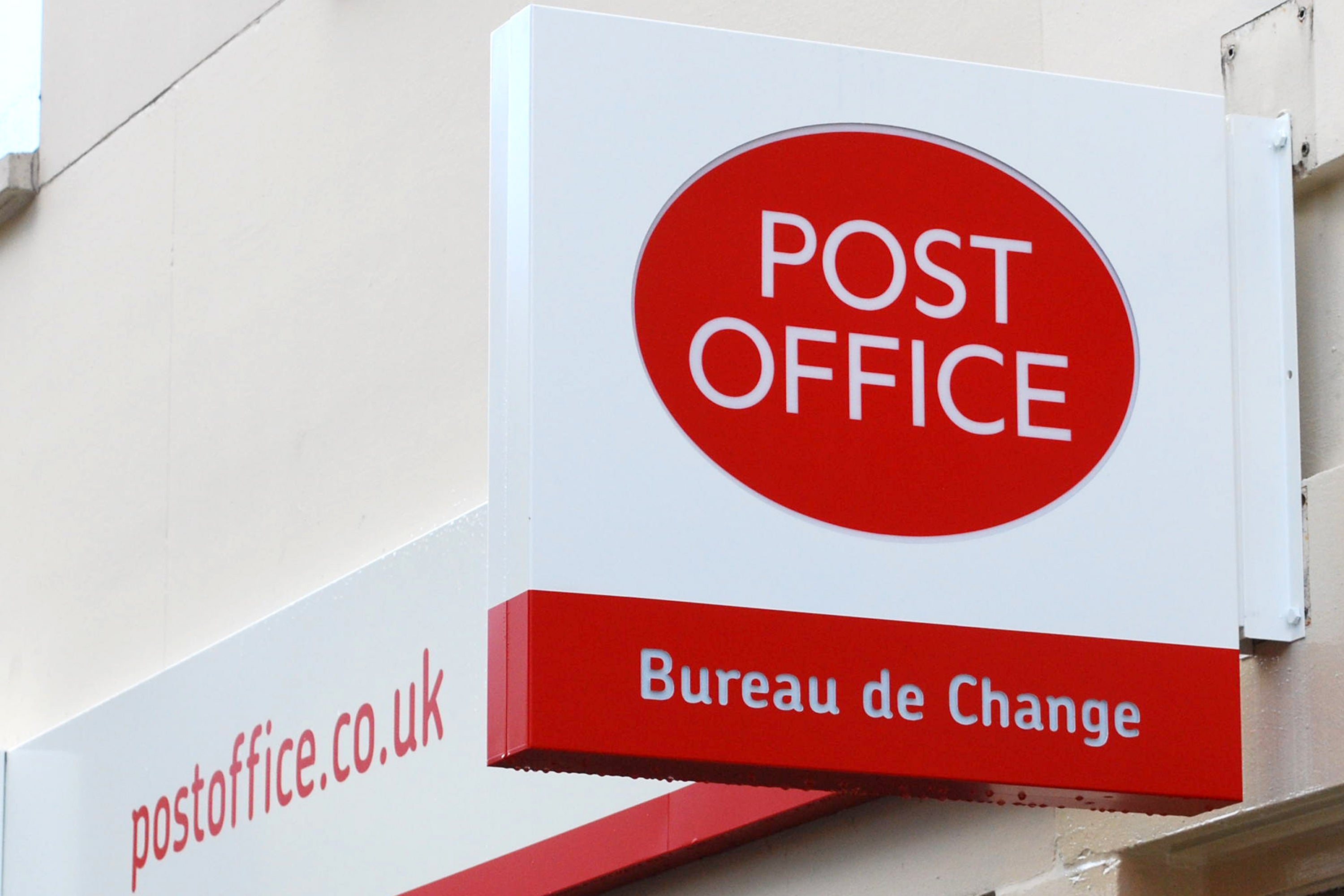 Closures of local bank branches across the UK have increased demand for cash deposit services at Post Offices, according to research (PA)