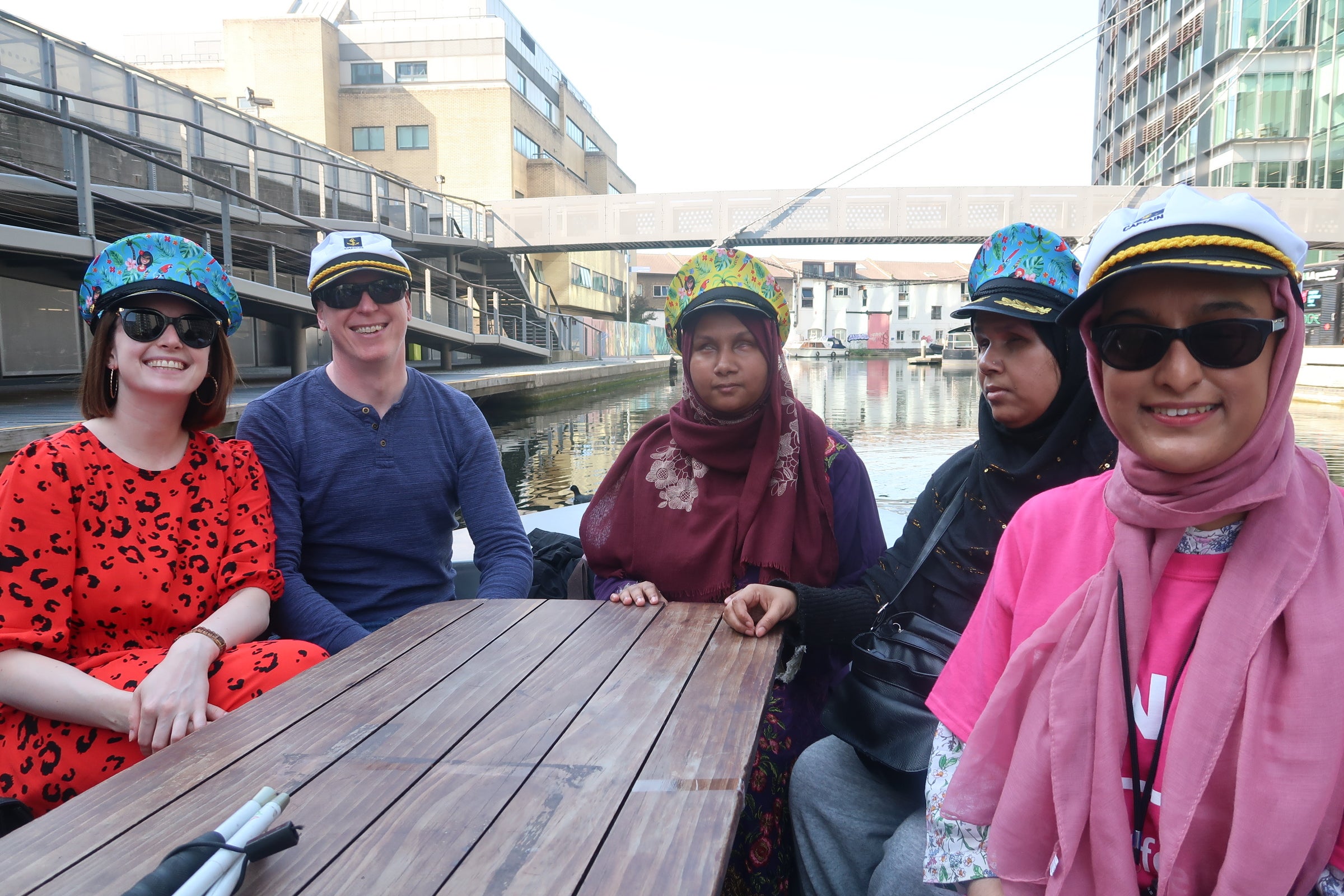 Nanjiba Misbah, centre, and other members of the RNIB on a boat trip (RNIB/GoBoat/PA)