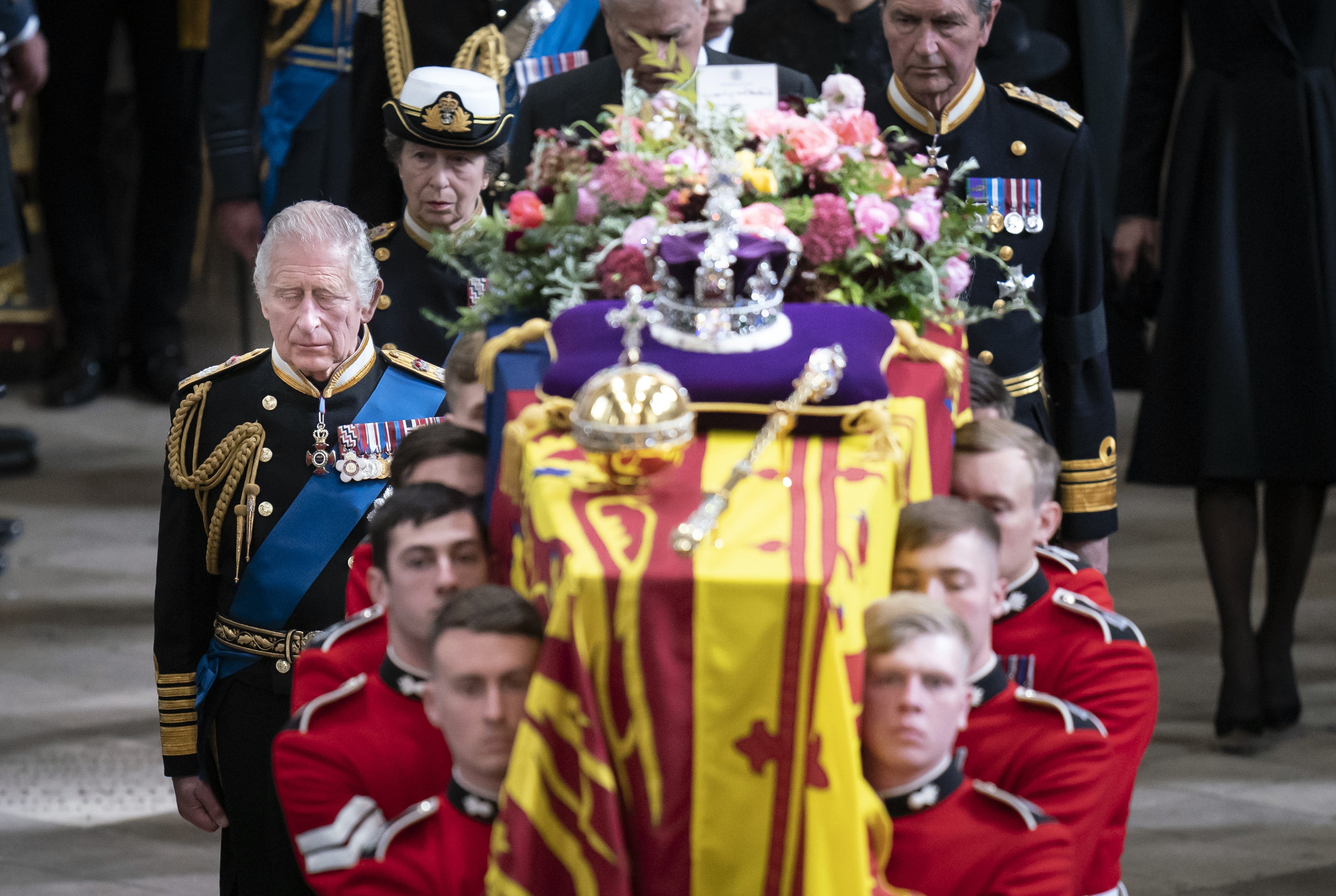 King Charles III and members of the royal family follow behind the Queen’s coffin as it is carried out of Westminster Abbey following the state funeral (Danny Lawson/PA)