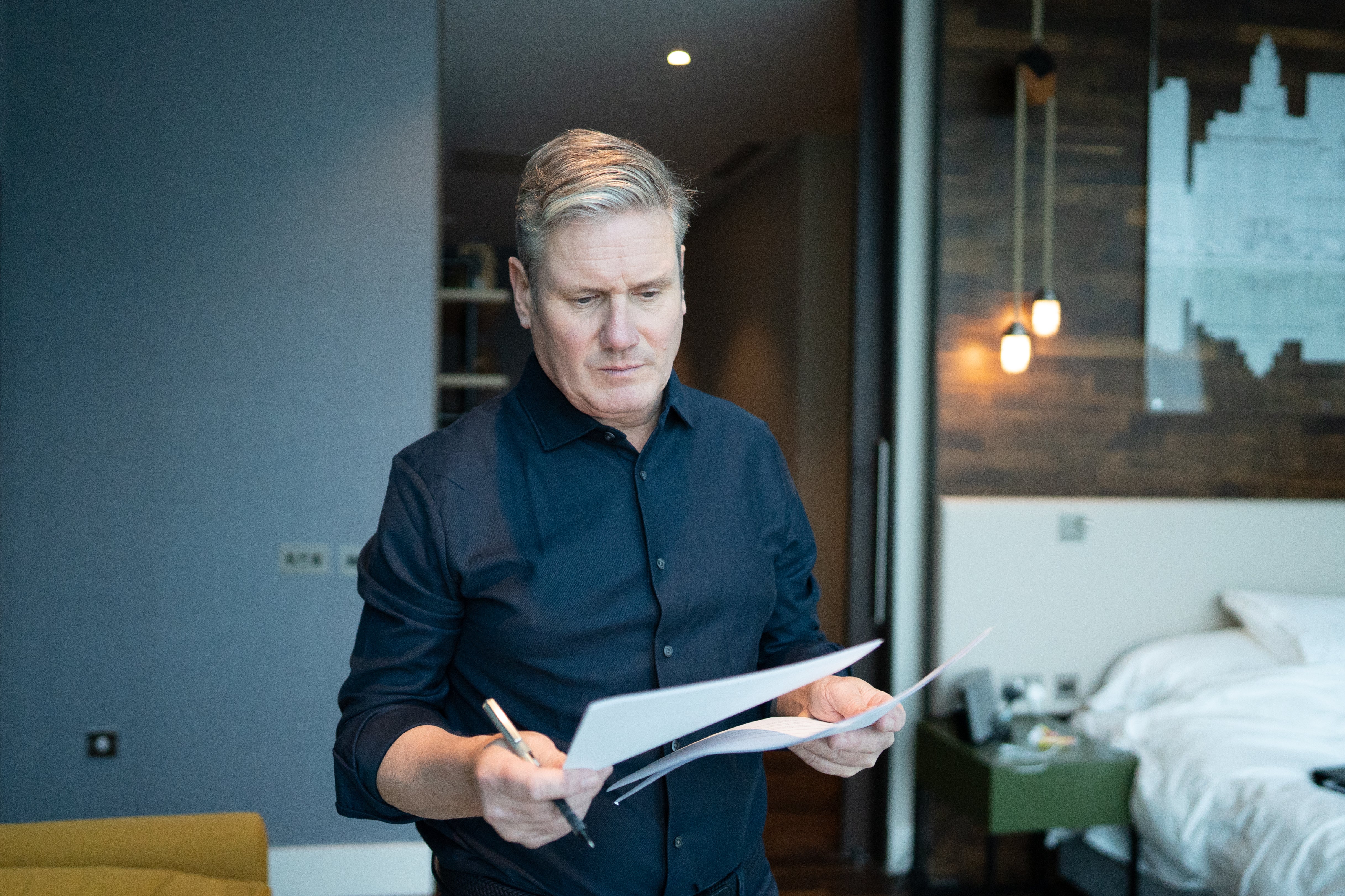 Labour leader Sir Keir Starmer in his hotel room in Liverpool preparing for his speech to delegates at the Labour Party Conference (Stefan Rousseau/PA)