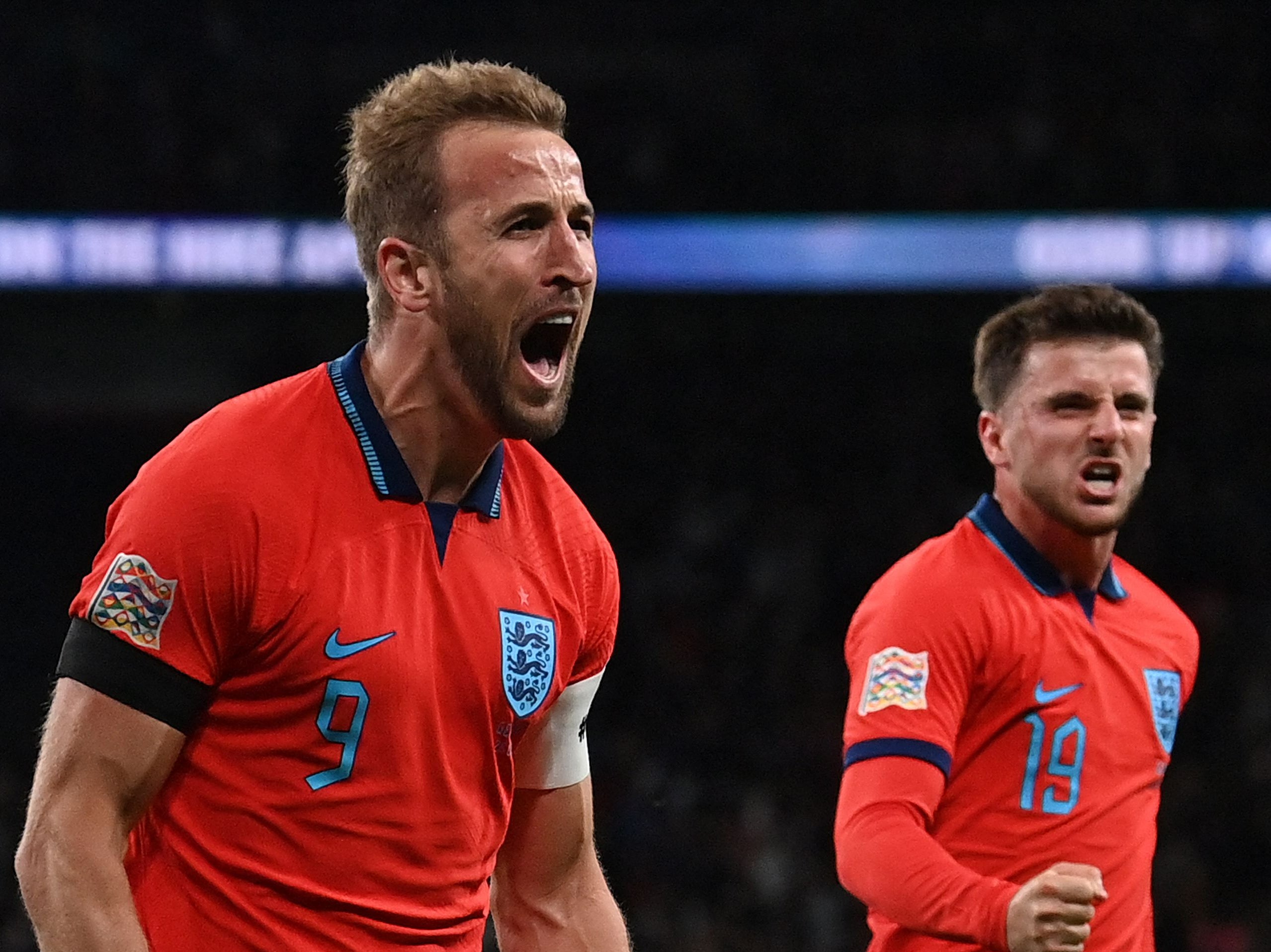 Harry Kane celebrates scoring with Mason Mount