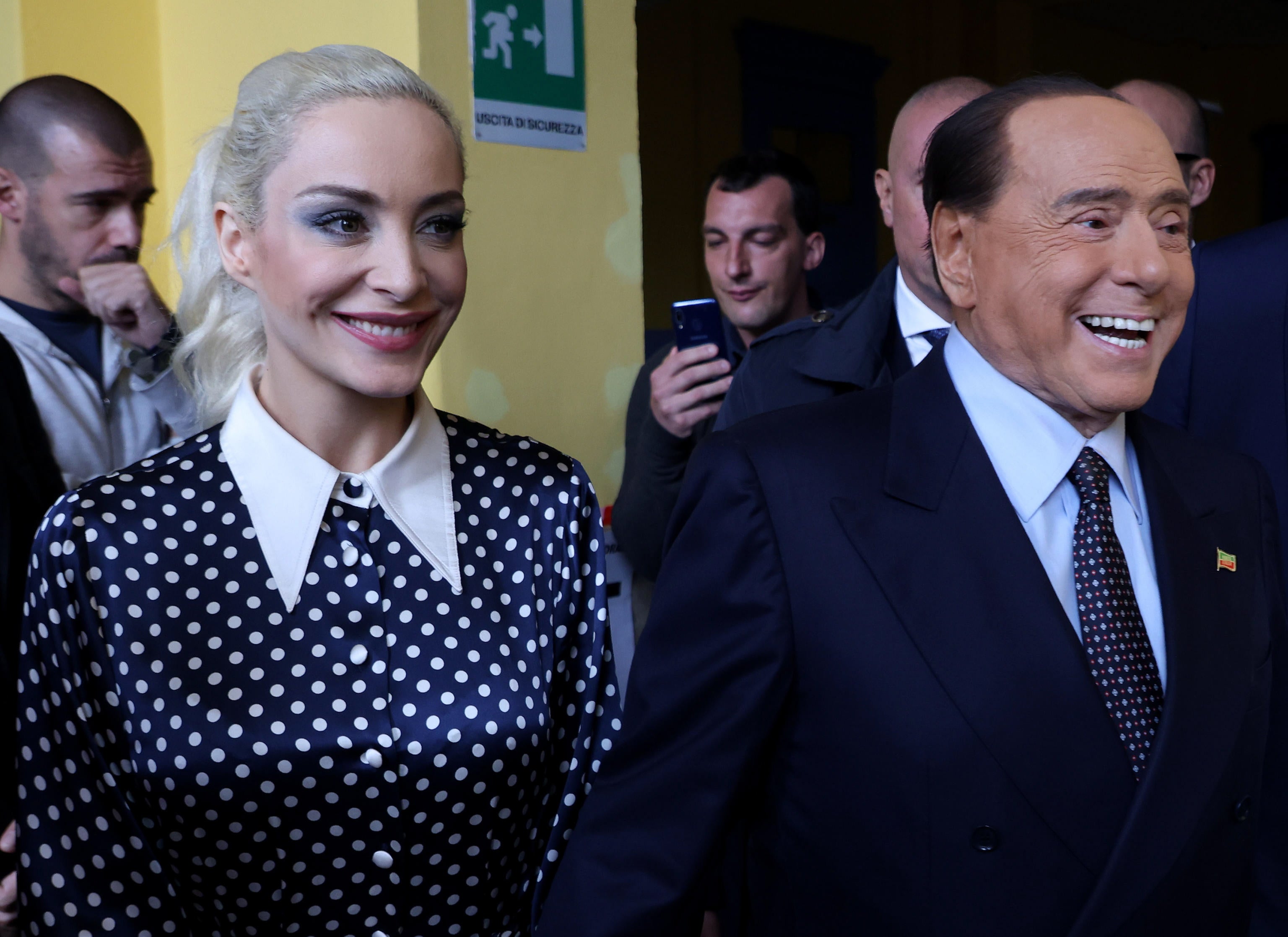 Berlusconi with Fascina at a polling station on Sunday