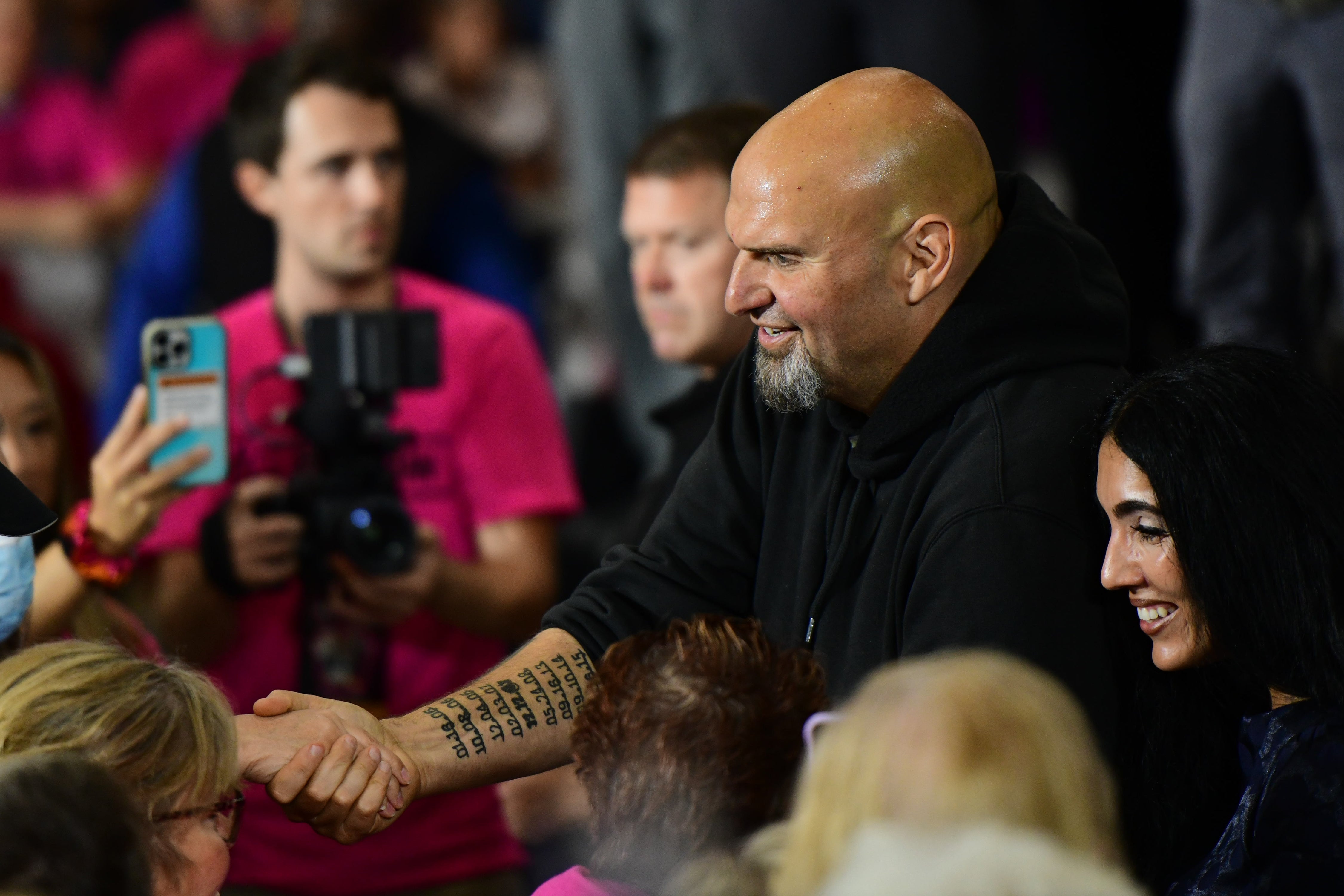 Democratic Pennsylvania Senate nominee John Fetterman greets supporters during a rally in Blue Bell, Pennsylvania