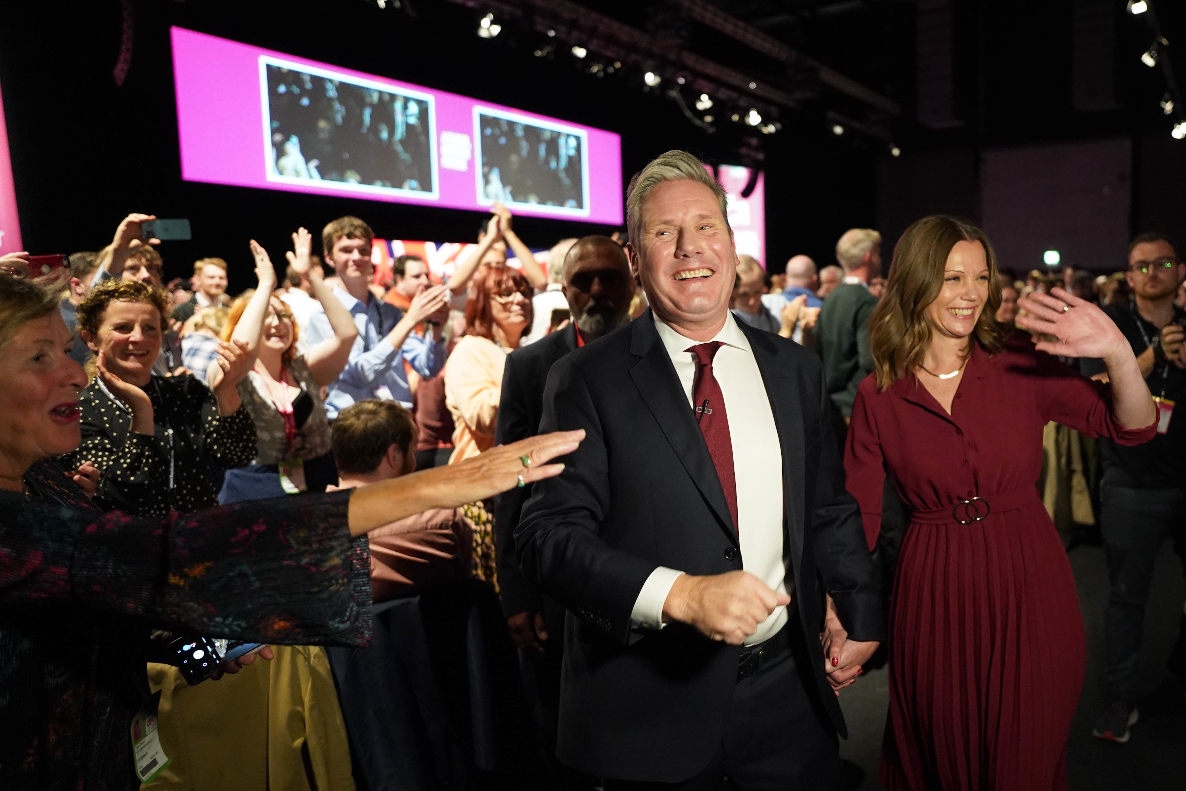 Labour Party leader Sir Keir Starmer, with his wife Victoria, leaves the stage after giving his keynote address during the Labour Party Conference at the ACC Liverpool (Stefan Rousseau/PA)