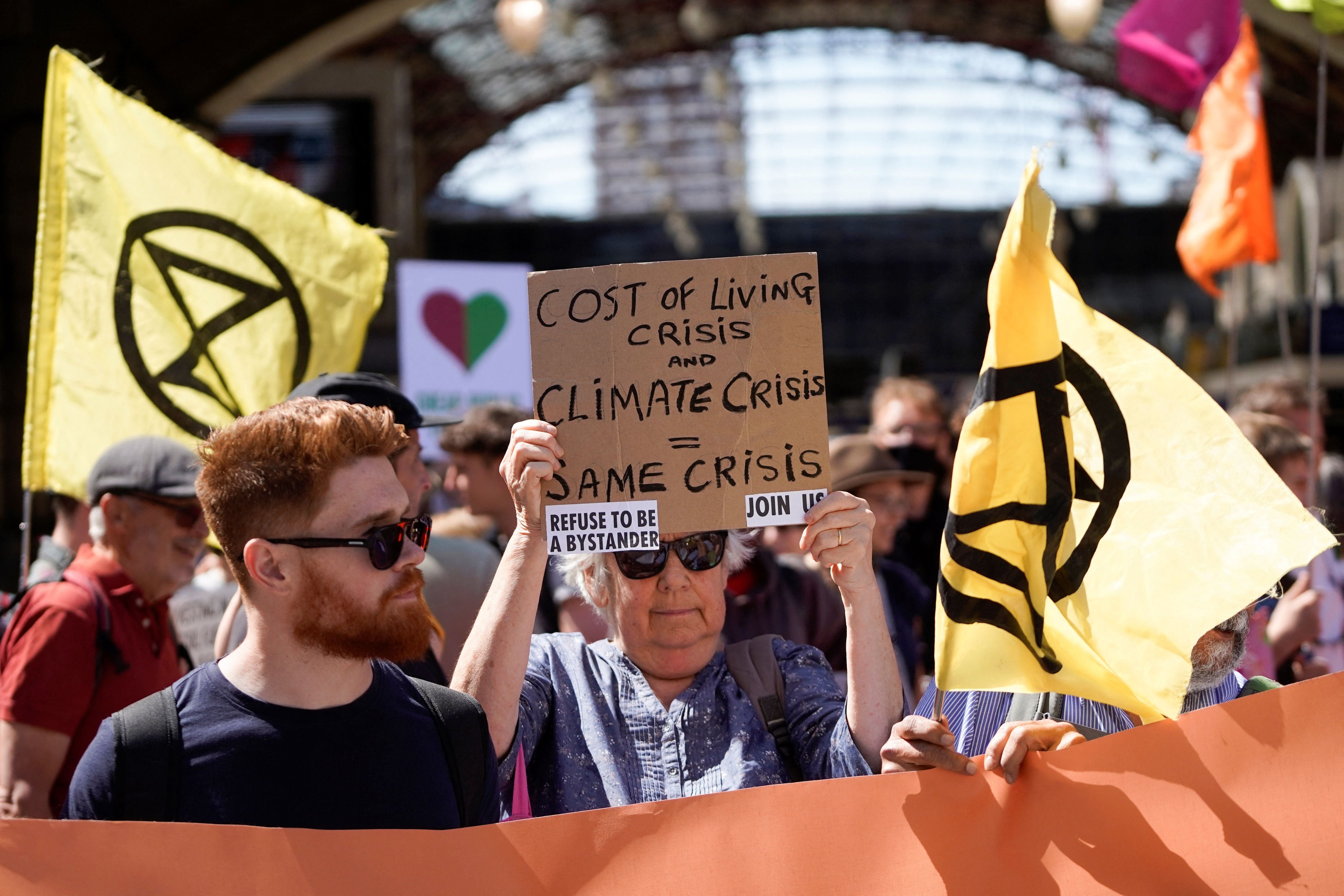 Demonstrators take part in a protest march from Victoria station to Parliament Square, in London