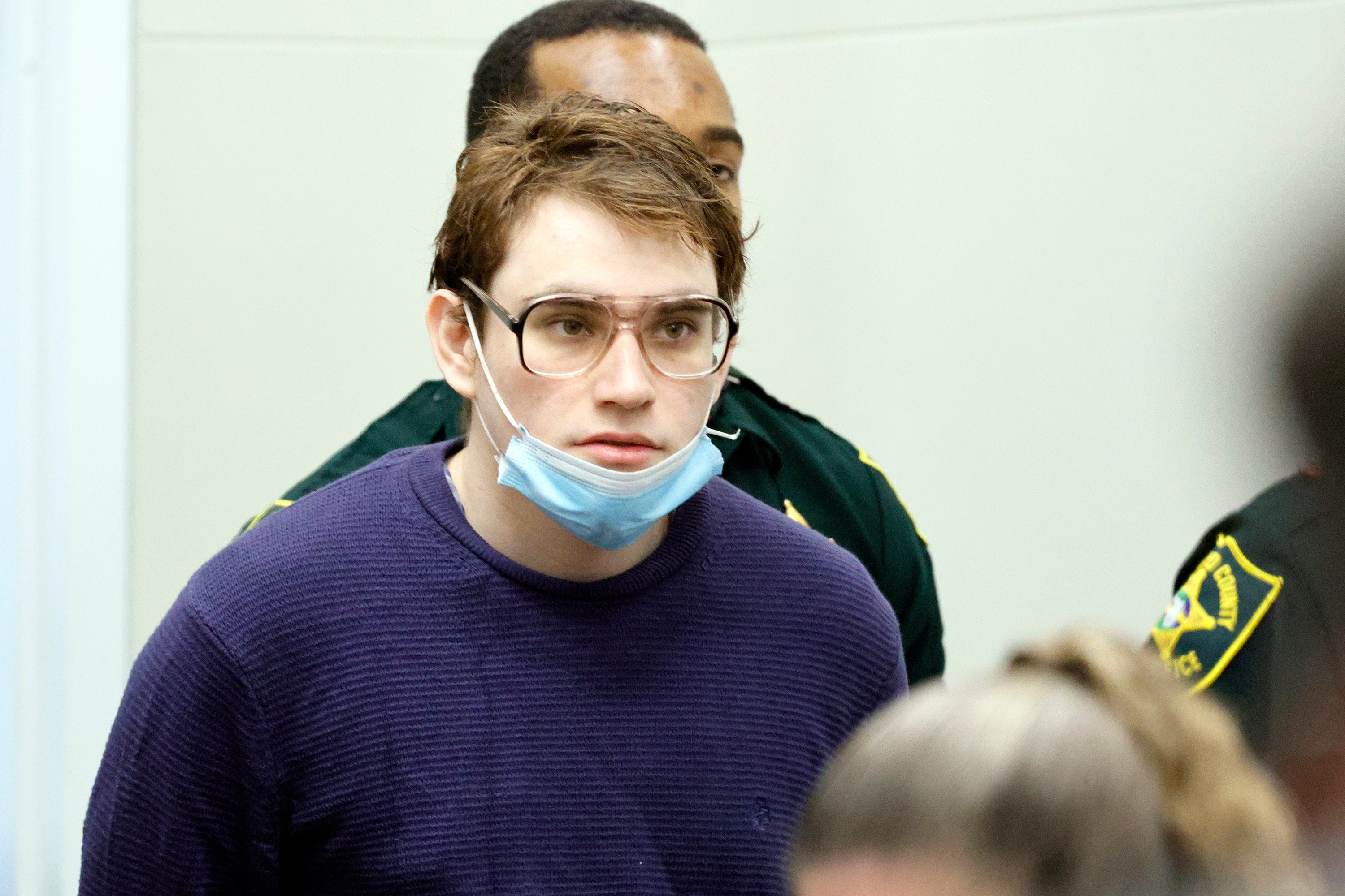 Marjory Stoneman Douglas High School shooter Nikolas Cruz enters the courtroom on 27 September