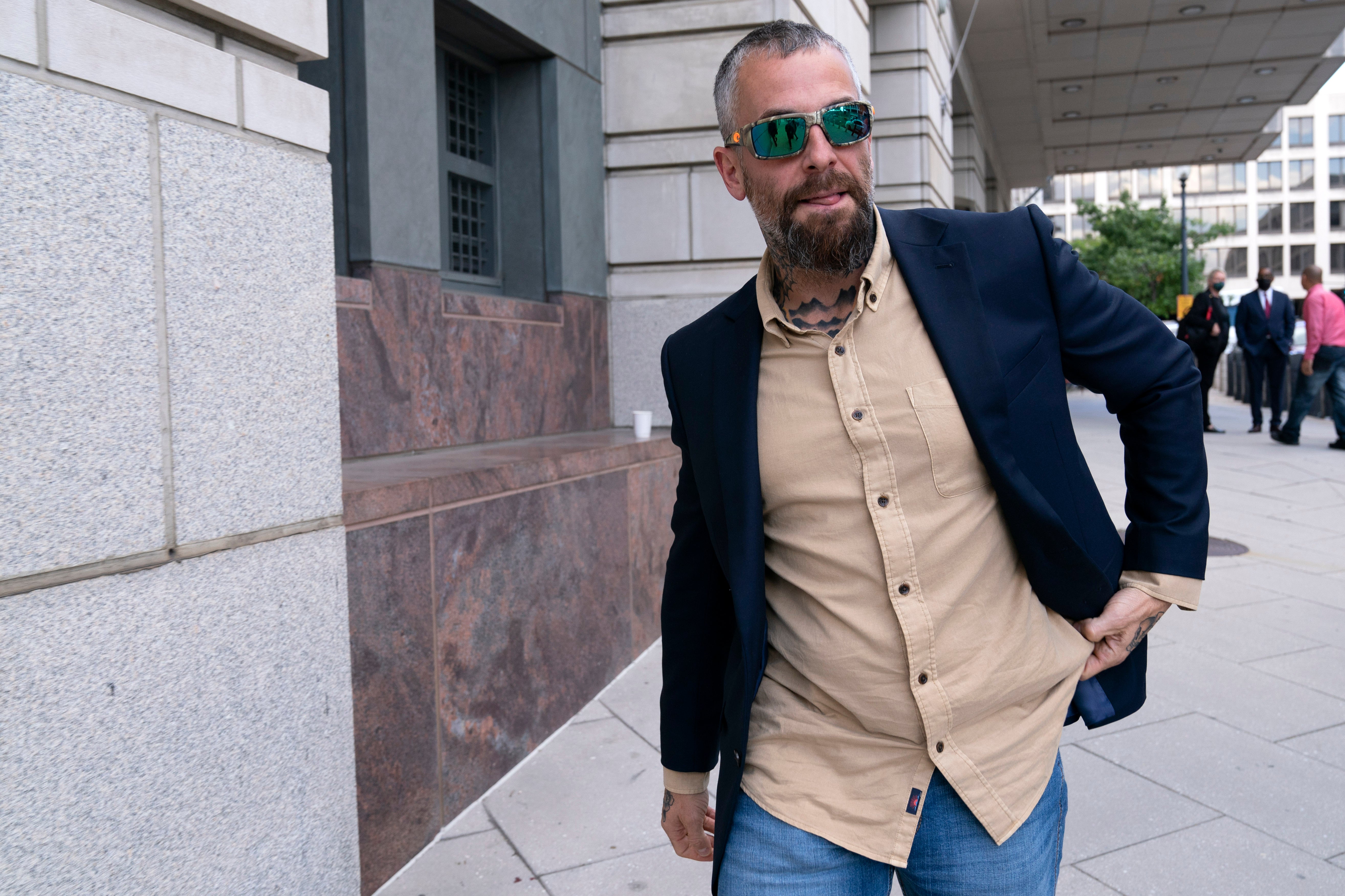 Former D.C. Metropolitan Police Officer Michael Fanone leaves the federal courthouse last week after the sentencing of Kyle Young